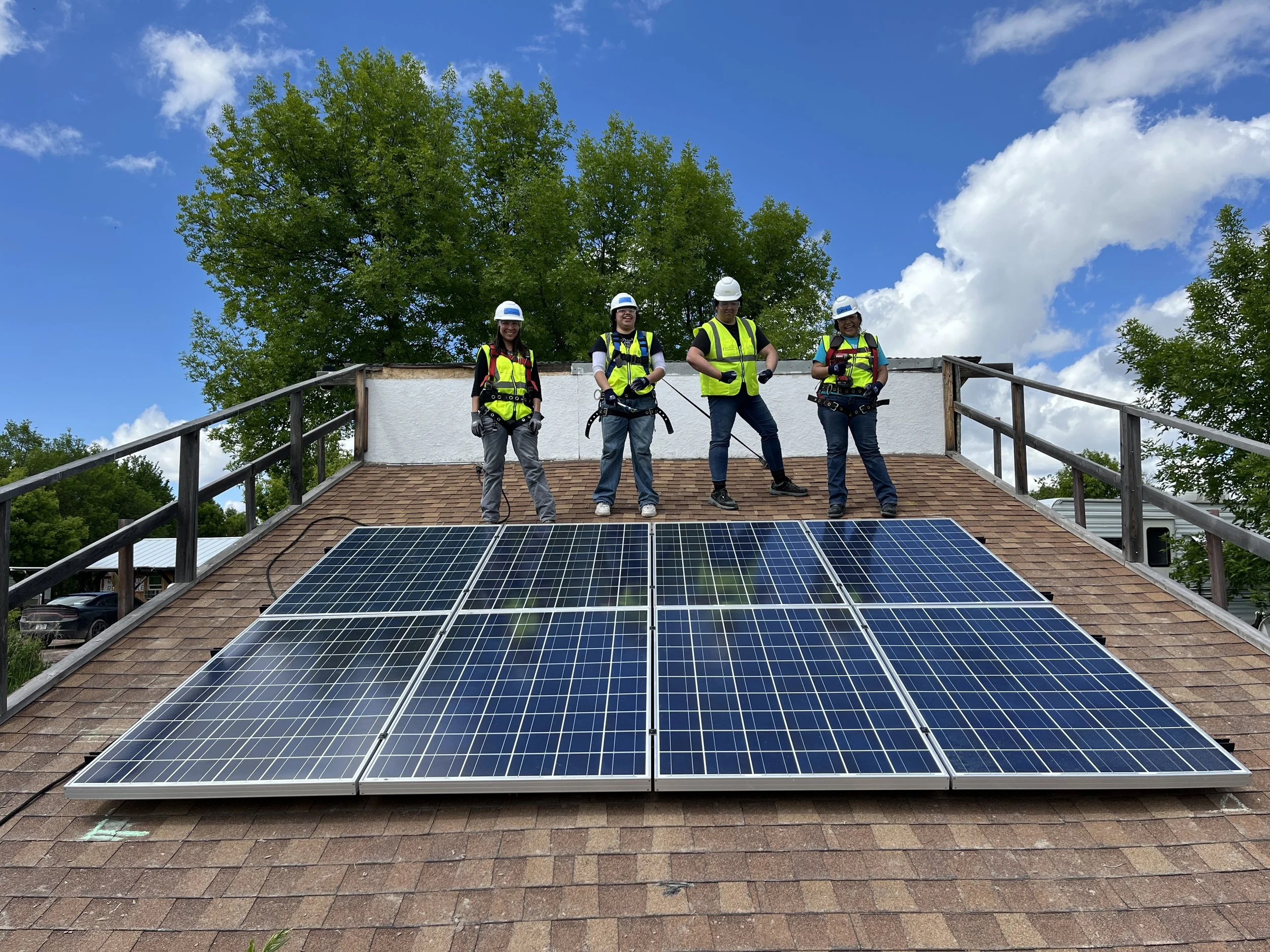 BRIDGE students with mock roof.JPG