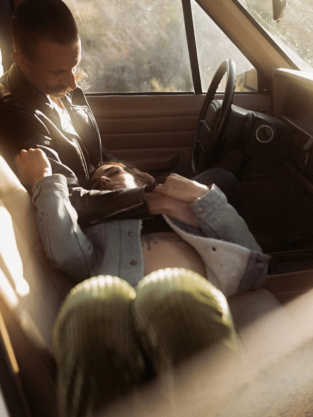 Southern California elopement photographer captures couple in jeep xj near Joshua tree national park. this moody rich edit is full of warm browns