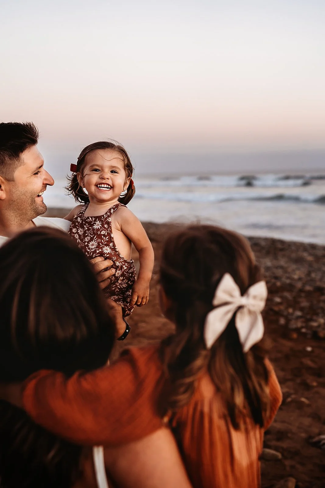 Southern California family photographer captures family on the beach In san Clemente California