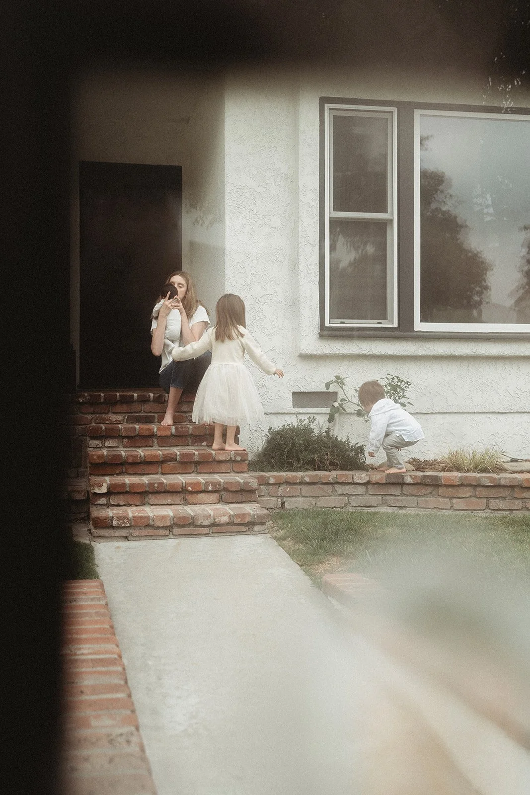 Southern California family photographer captures family in this rich, moody edit during an in home newborn session near Long Beach California.