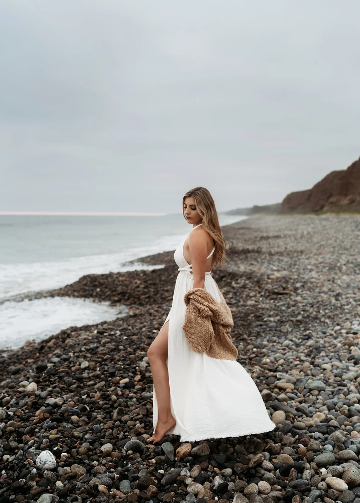 Southern California family photographer captures family on the rocky beach near san Clemente California.