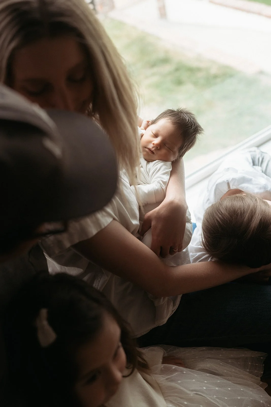 Southern California family photographer captures family in this rich, moody edit during an in home newborn session near Long Beach California.