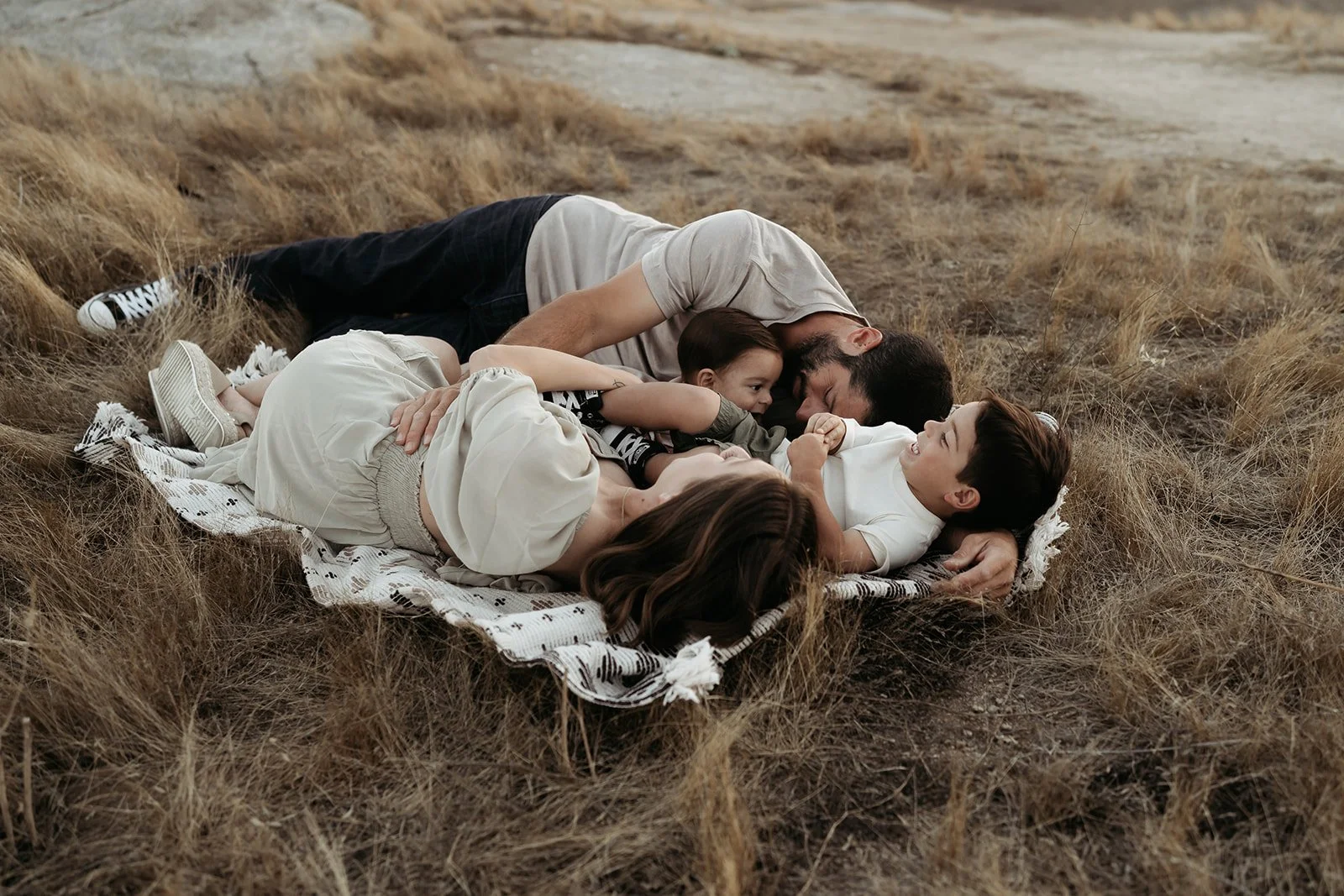 Southern California family photographer captures family in this rich, moody edit at sycamore creek park in riverside California.