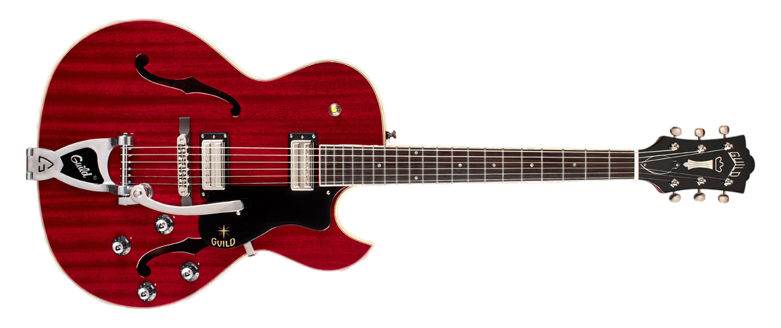 A large, red hollowbody electric guitar with two pickups and a vibrato bar
