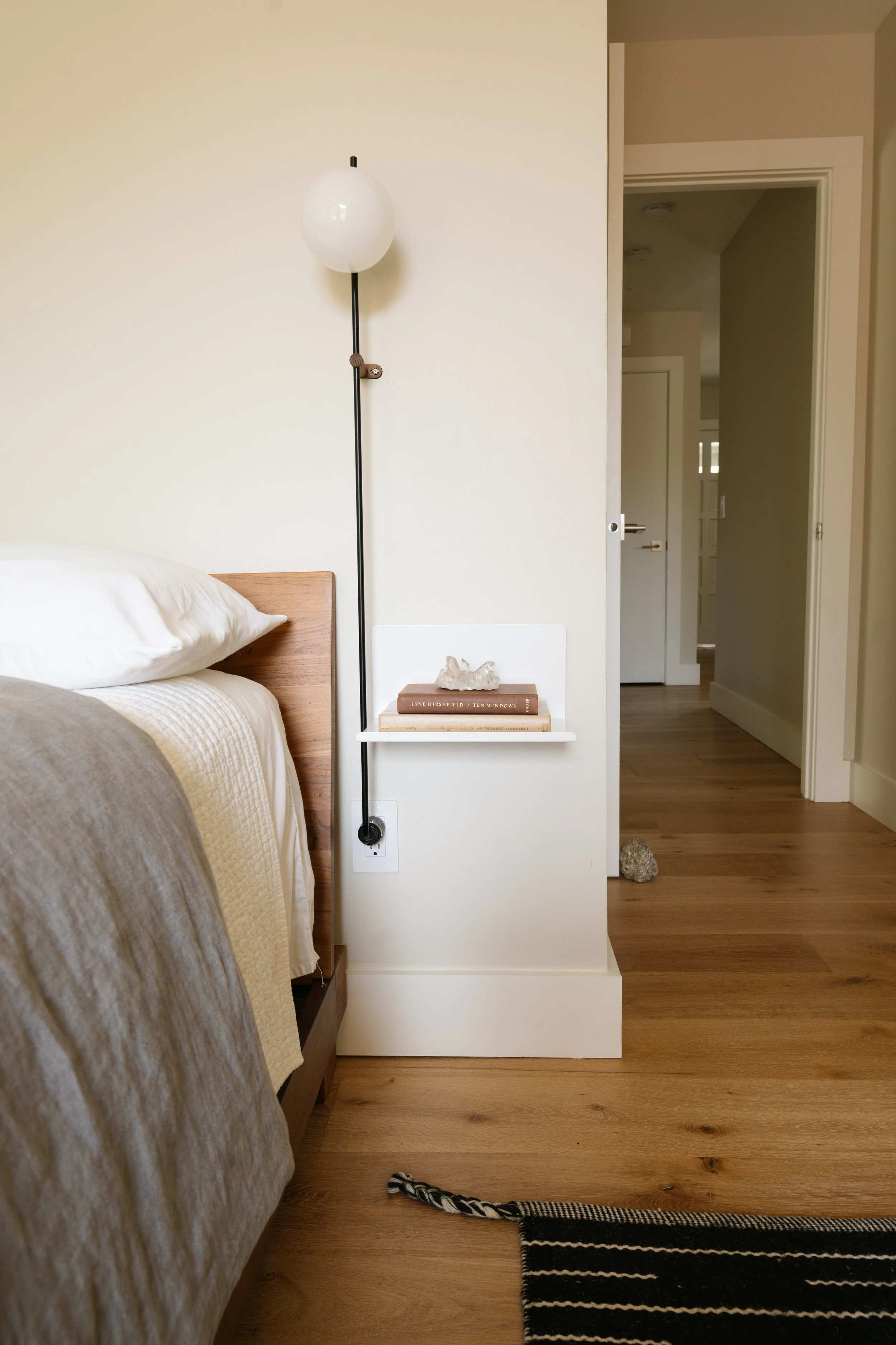 Bedroom with wall sconce