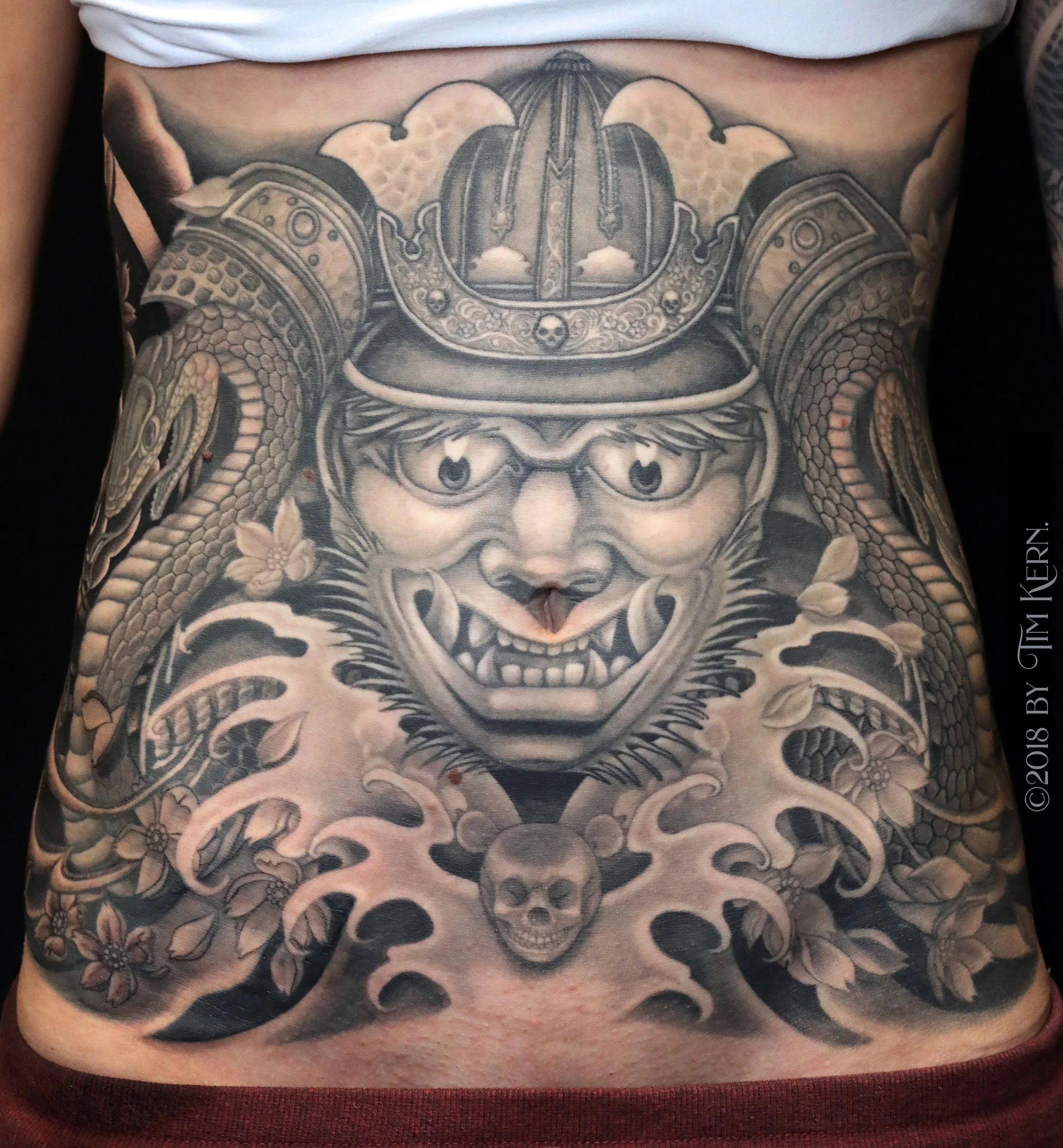 Oni-Samurai_Snake-Skull-Cherry-Blossom-Stomach-Tattoo-copy.jpg
