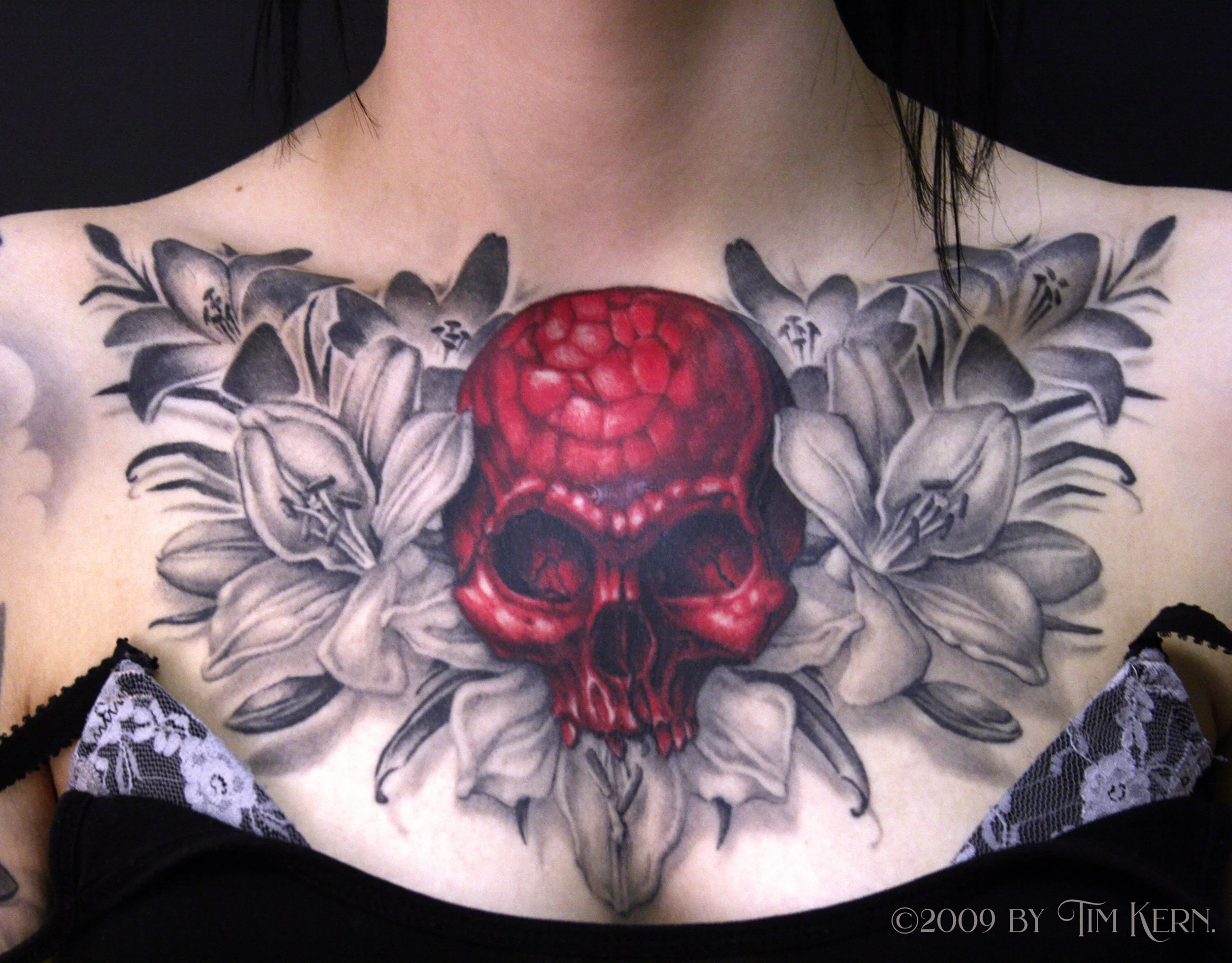 Lilie-Lily-Red-Skull-Female-Original-Chestpiece-Tattoo.jpg