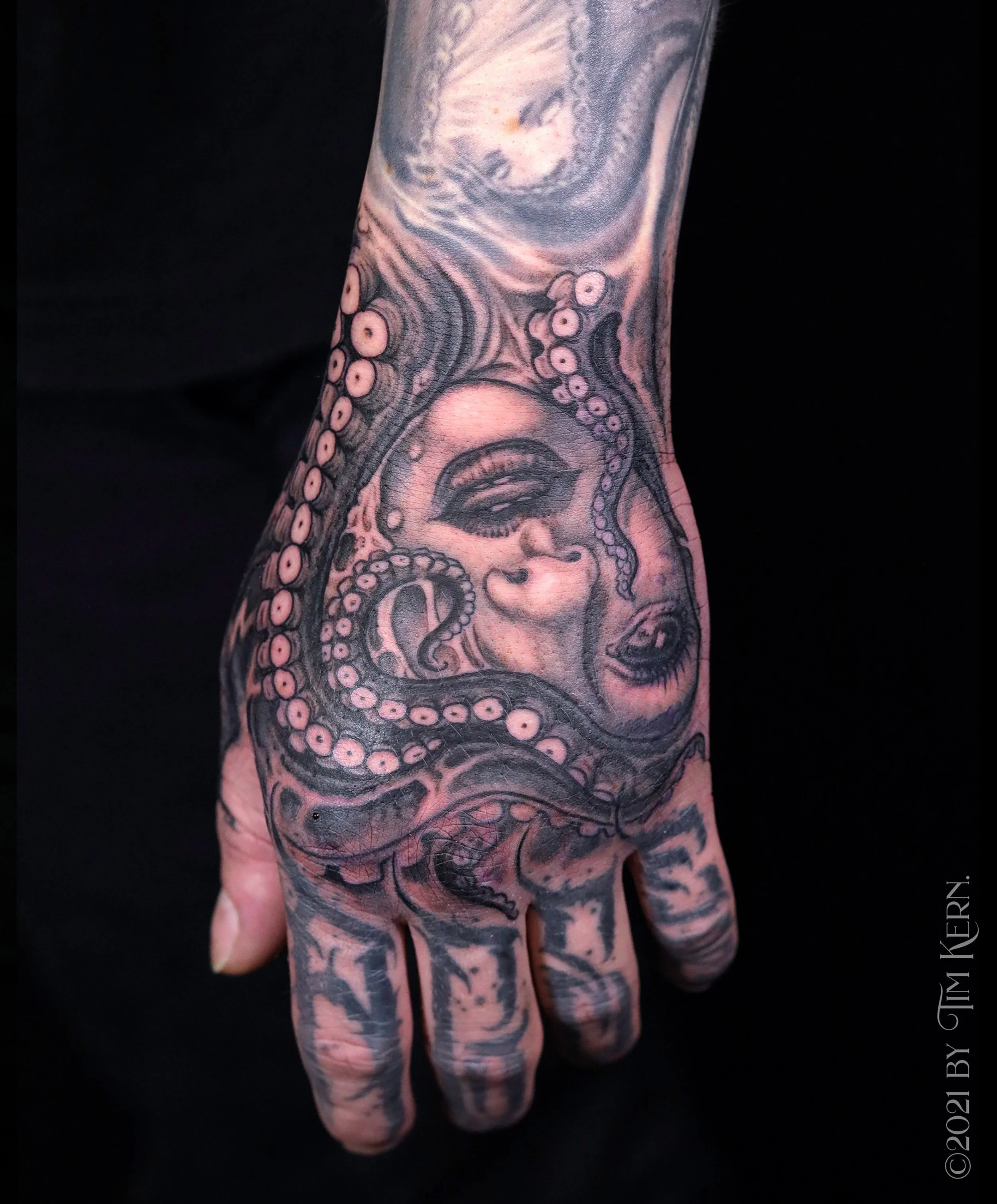 Doll-Tentacle-Hand-Tattoo.jpg