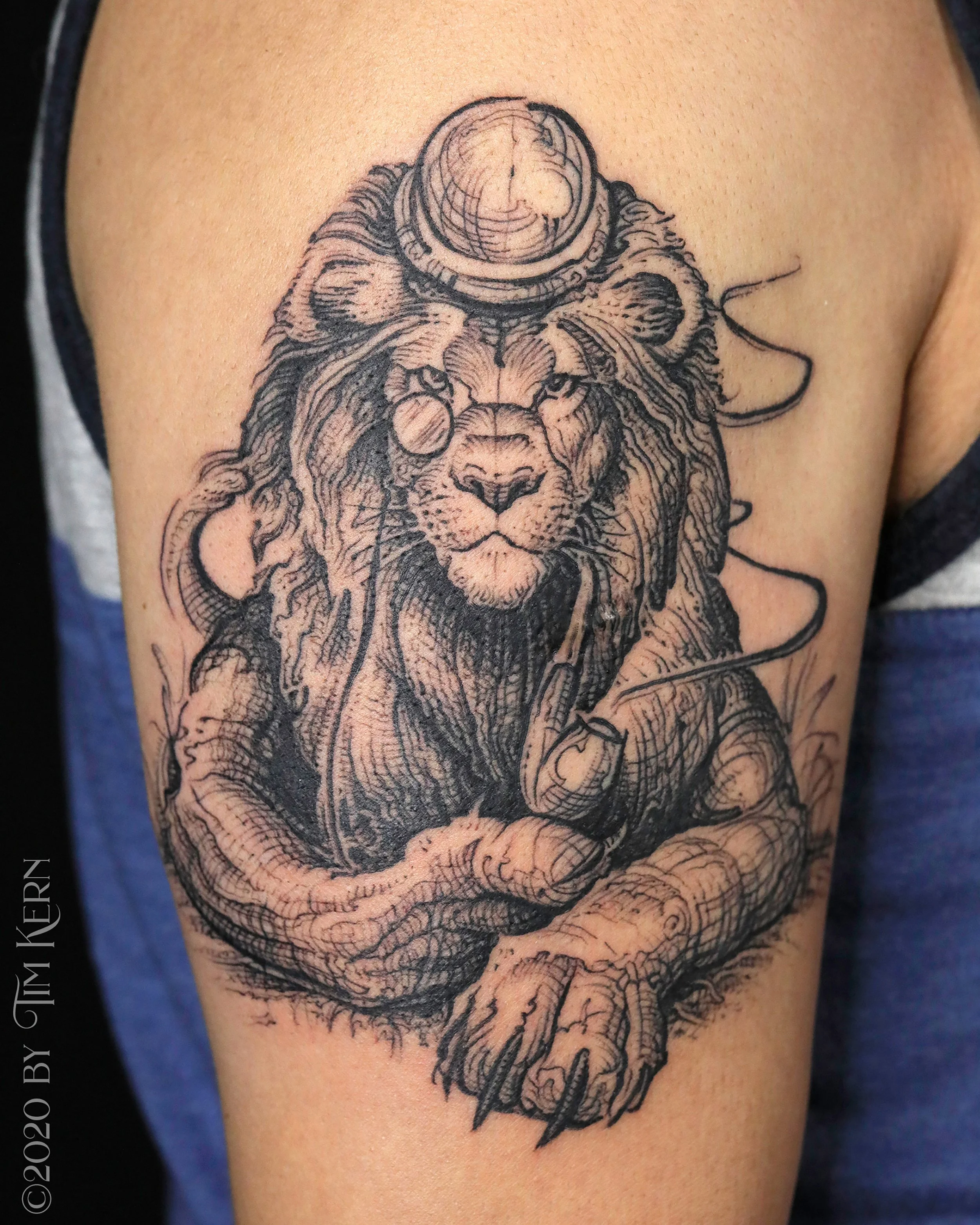 Gentleman-Lion-Engraving-Tattoo.jpg