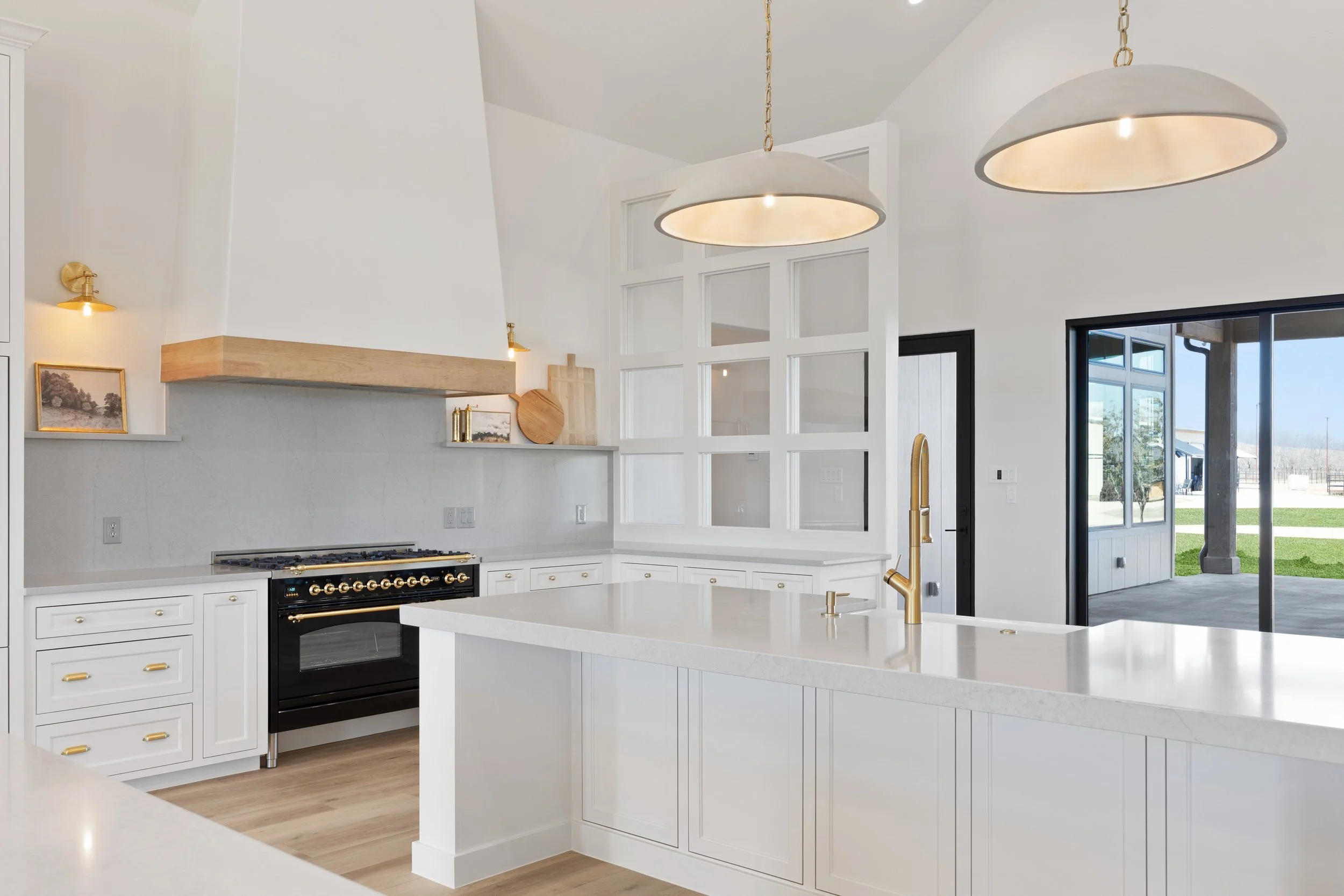 Luxury custom home in DFW with double islands and black appliances