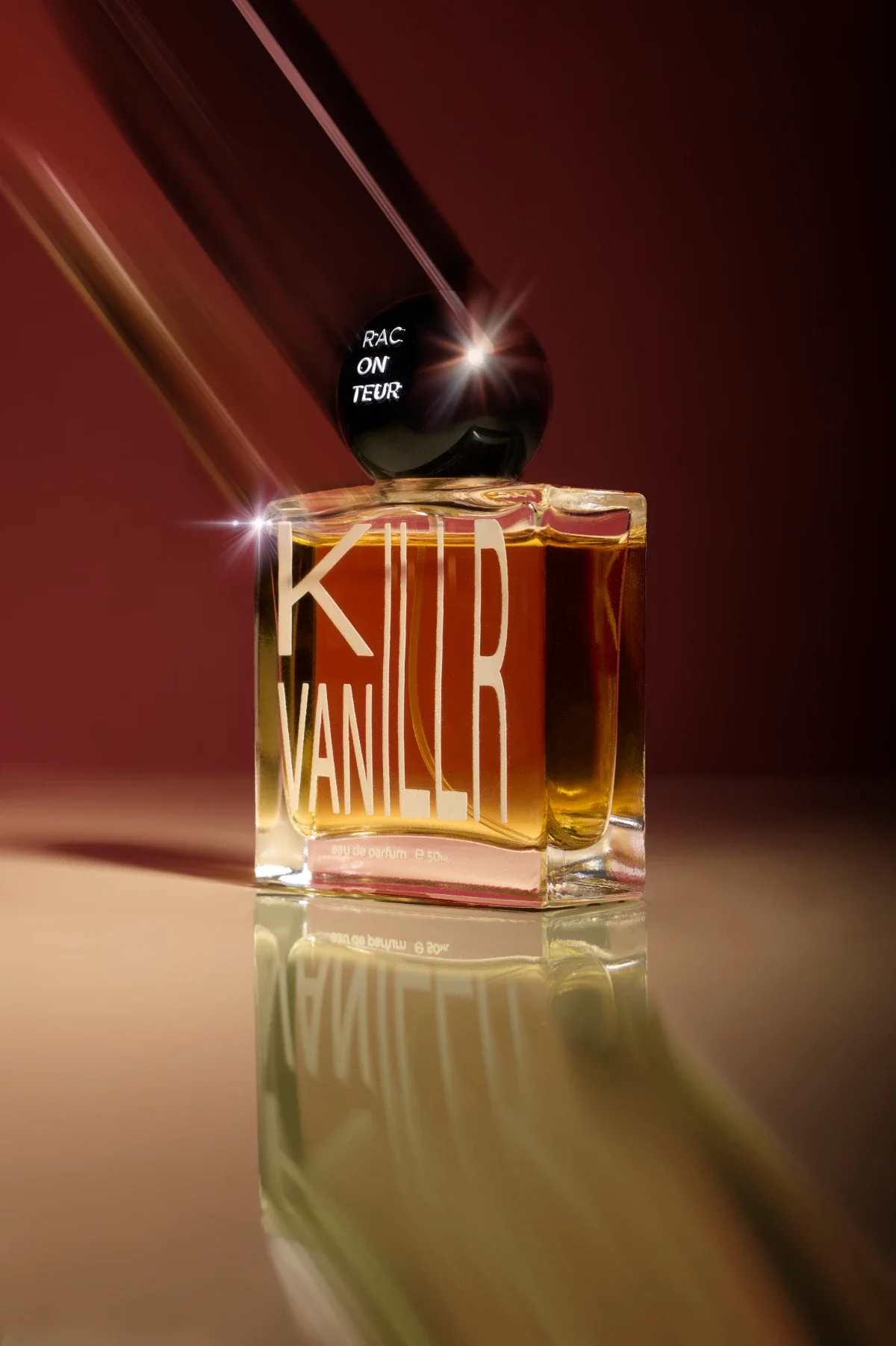 Creative luxury perfume product photography of blurred bottle with dark red beige background. Photo for e-commerce, campaigns, and marketing.