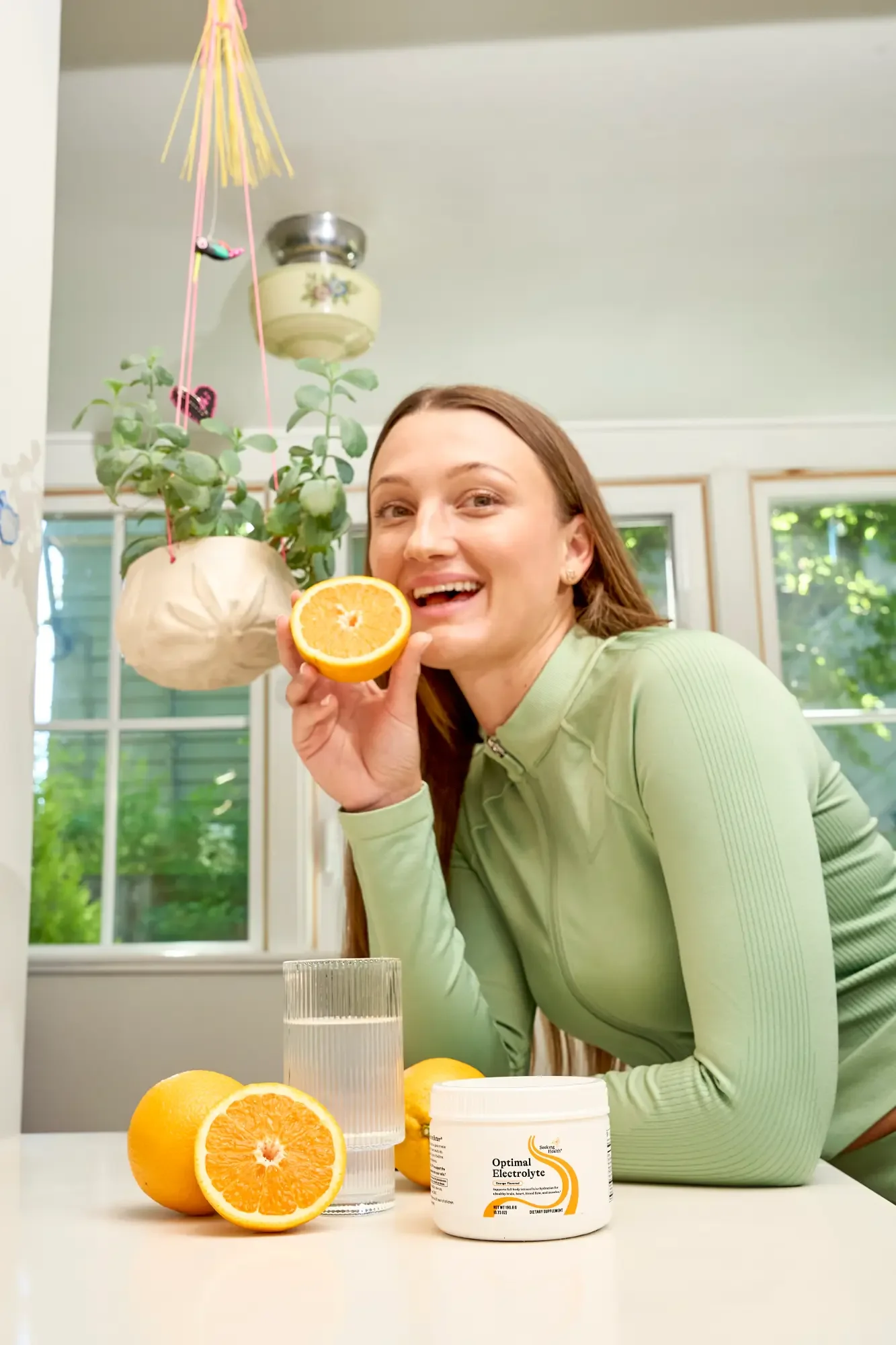 Seattle high-end wellness product photography of vitamins held by female model to highlight premium ingredients and lifestyle branding. Ideal for beauty, skincare, and wellness brands seeking clean, editorial visual content for e-commerce, campaigns,