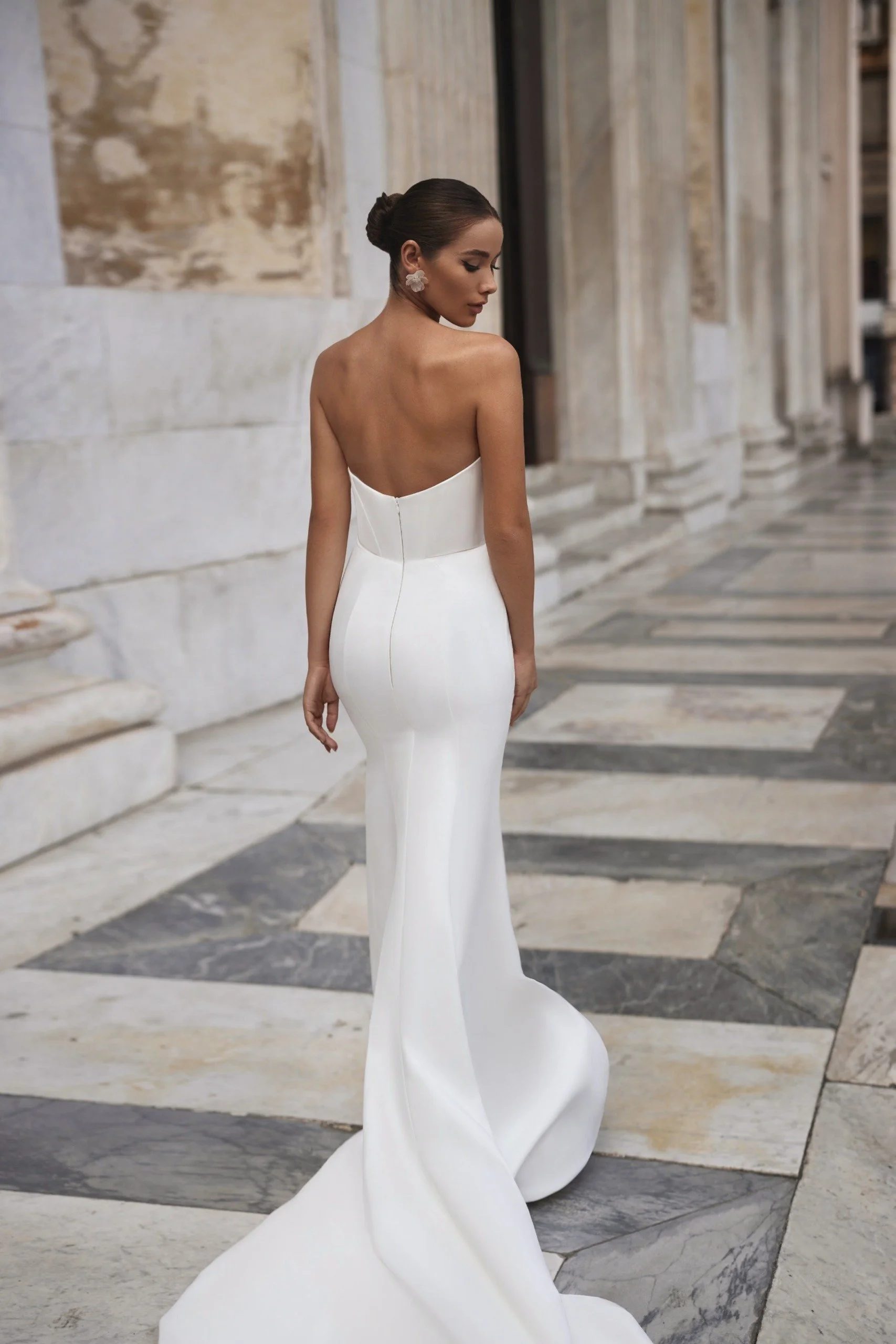 The ERICA wedding dress is a perfectly tailored minimalist mermaid gown with optional lace bodysuit exclusive to Spellbound Bridal, Arklow, Co Wicklow.