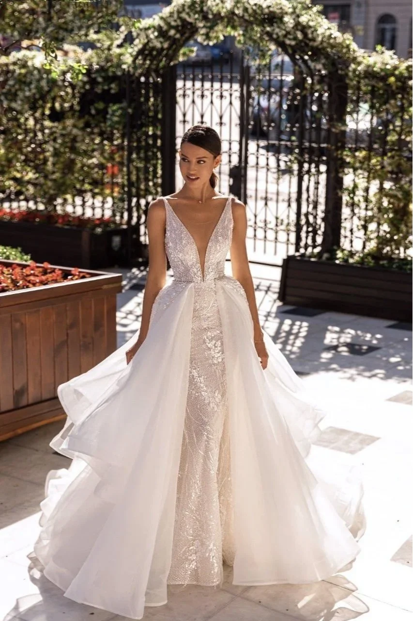 Edith+fit+and+flare+mermaid+style++beaded+wedding+dress+with+plunging+deep+V-neckline+shoulder+straps+and+waterfall+chiffon+overskirt_Spellbound+Bridal+Wicklow+Ireland.jpg