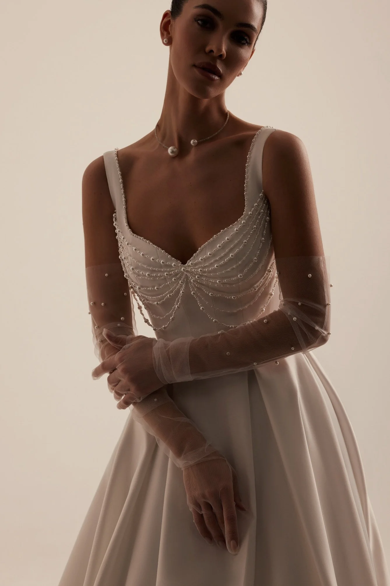 PATRICE is an elegant soft satin bridal A-line gown. Perfect for brides who want a classic with modern pearl accents. Exclusively available at Spellbound Bridal, Wicklow, Ireland.
Dress Designer: Katy Korso