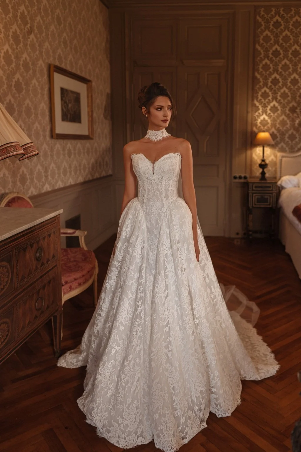 AVEL is a Chantilly lace ballgown style wedding dress. Brides can choose to complete their wedding day look with a lace choker that extends into a long cape-style train. Exclusively available at Spellbound Bridal, Wicklow, Ireland.
Dress Designer: Ka