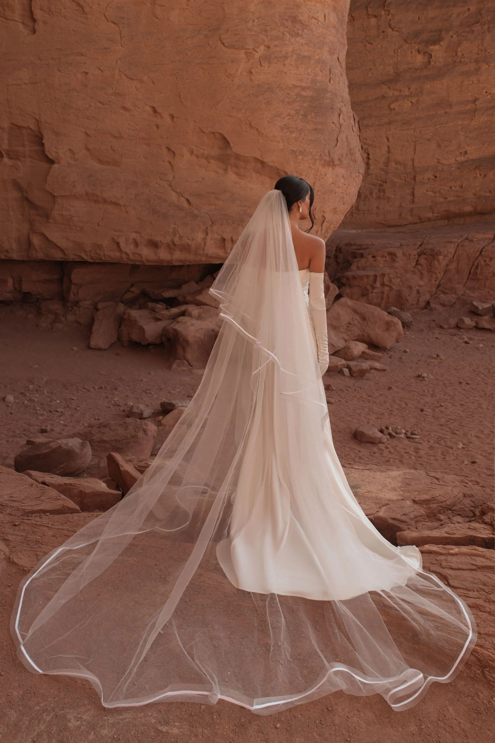 Crafted in luminous ivory satin, ORI is the bridal gown embodiment of modern goddess elegance. Designer: Katy Corso. Exclusive to Spellbound Bridal, Wicklow, Ireland.