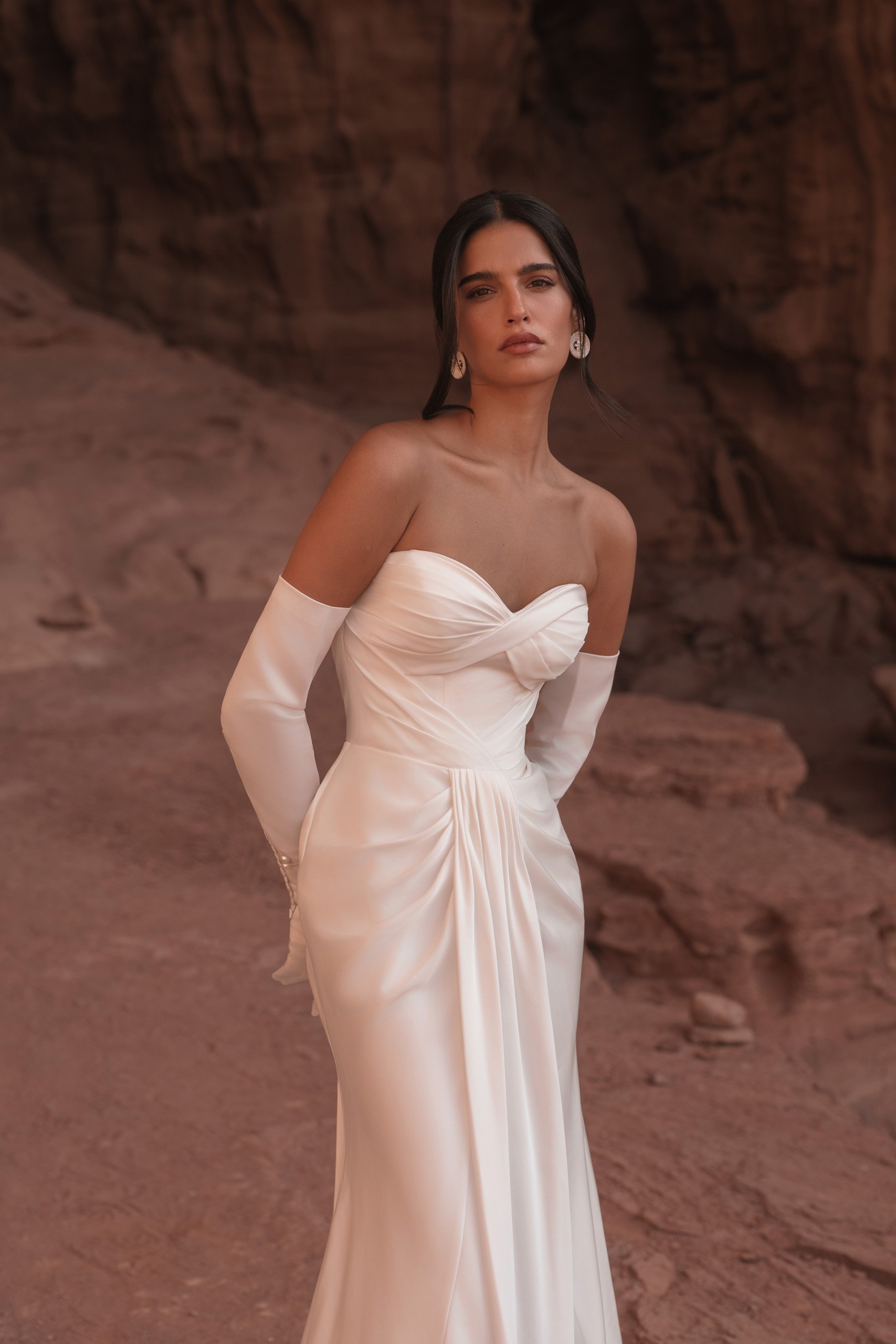 Crafted in luminous ivory satin, ORI is the bridal gown embodiment of modern goddess elegance. Designer: Katy Corso. Exclusive to Spellbound Bridal, Wicklow, Ireland.