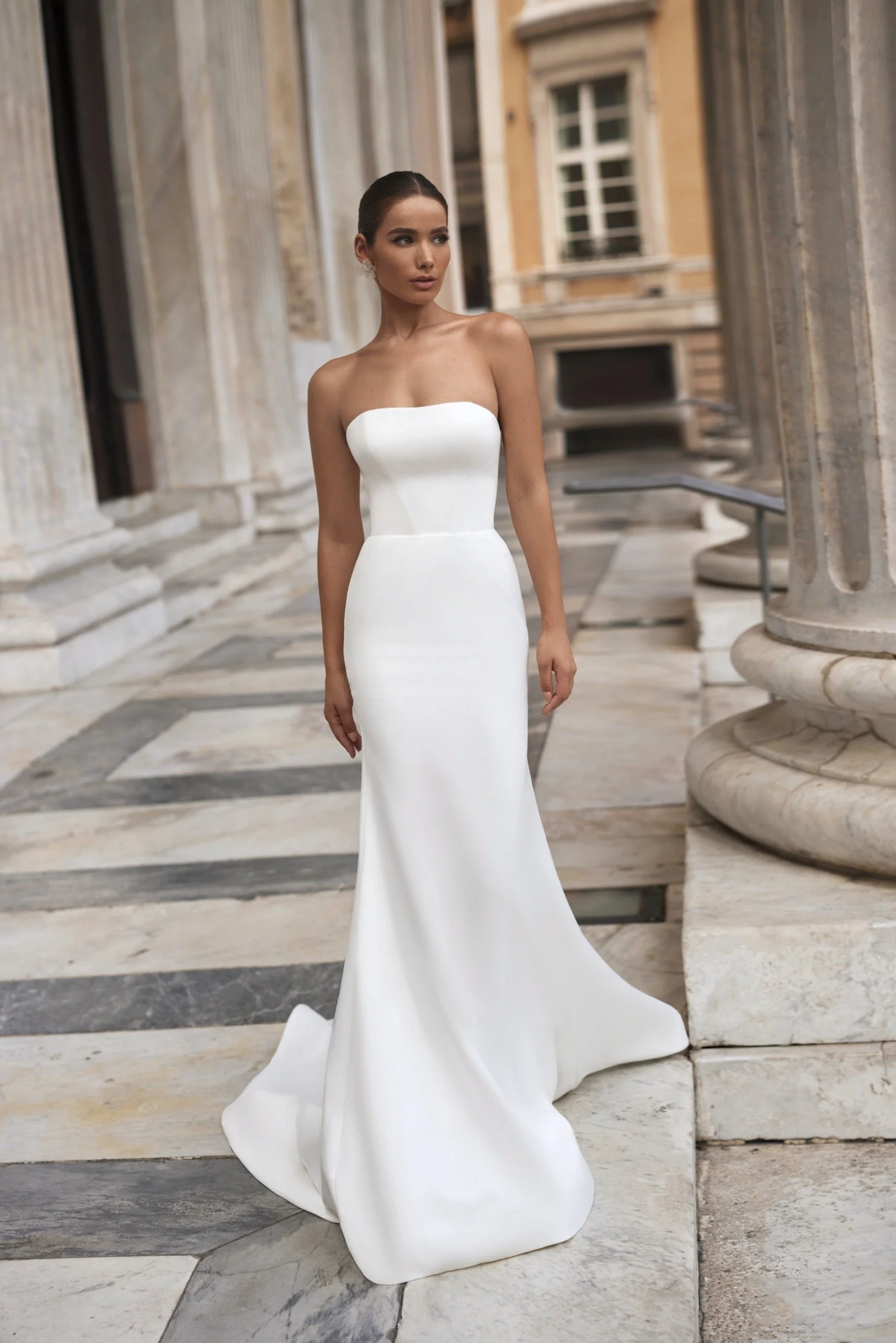 The ERICA wedding dress is a perfectly tailored minimalist mermaid gown with optional lace bodysuit exclusive to Spellbound Bridal, Arklow, Co Wicklow.