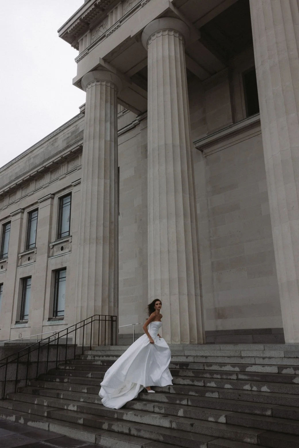 Aneta by Trish Peng stretch Mikado wedding dress featuring a modern drop waist, expertly ruched bodice and elegant A-line skirt, available at Spellbound Bridal Ireland.
