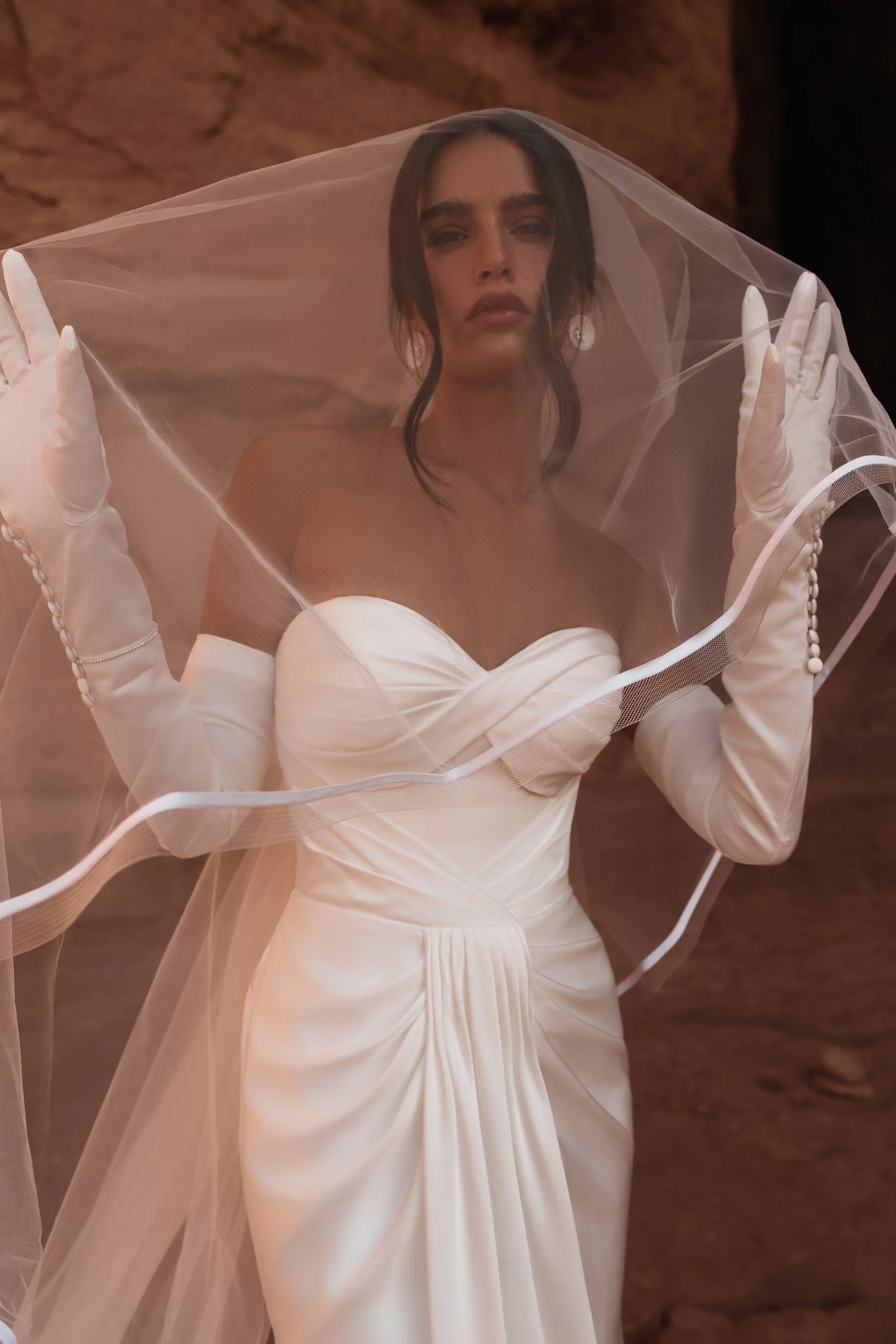 Crafted in luminous ivory satin, ORI is the bridal gown embodiment of modern goddess elegance. Designer: Katy Corso. Exclusive to Spellbound Bridal, Wicklow, Ireland.
