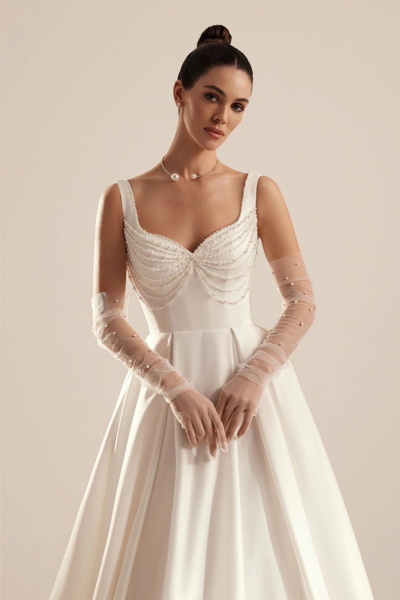 PATRICE is an elegant soft satin bridal A-line gown. Perfect for brides who want a classic with modern pearl accents. Exclusively available at Spellbound Bridal, Wicklow, Ireland.
Dress Designer: Katy Korso
