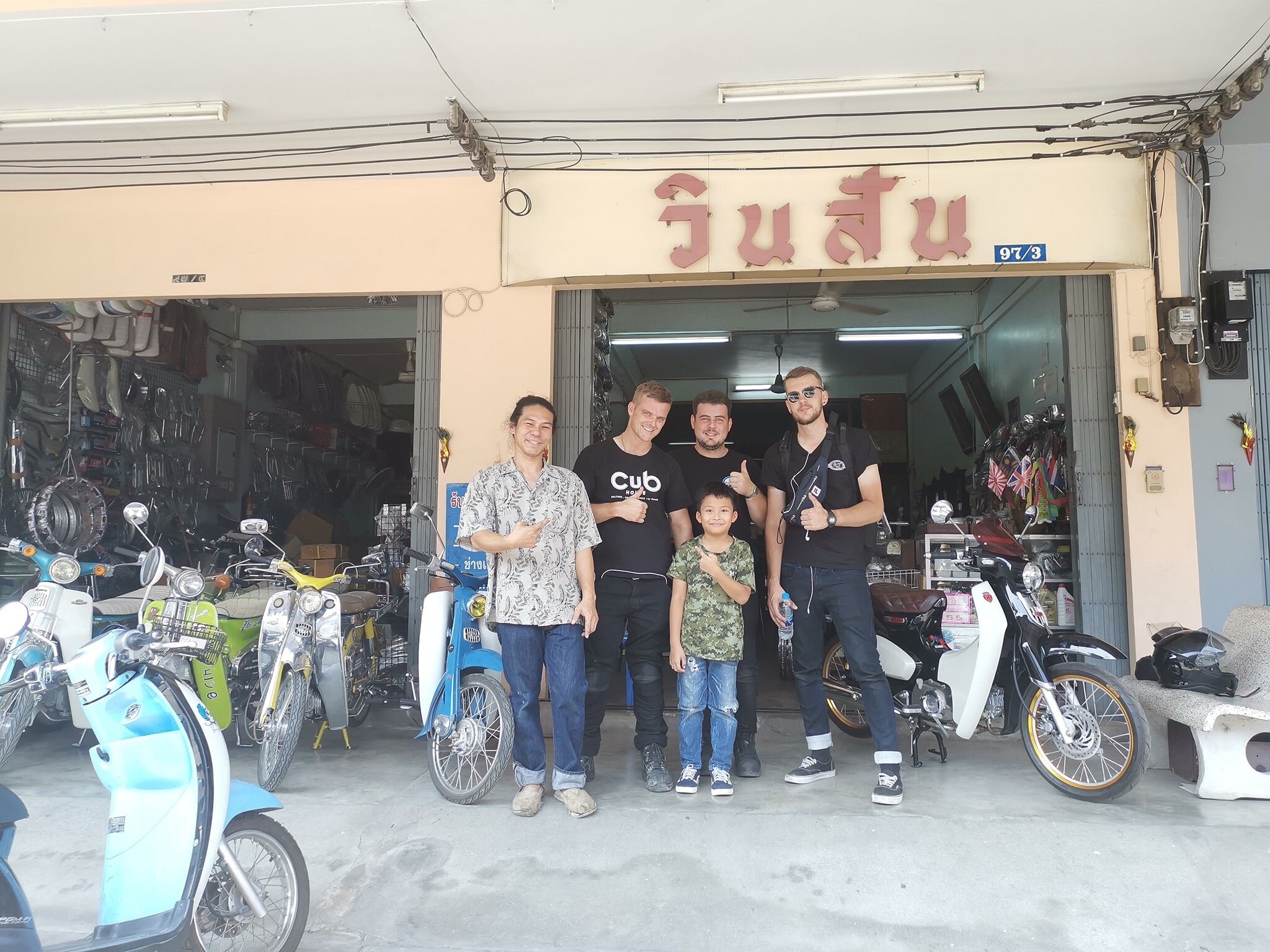 With the owner of the shop