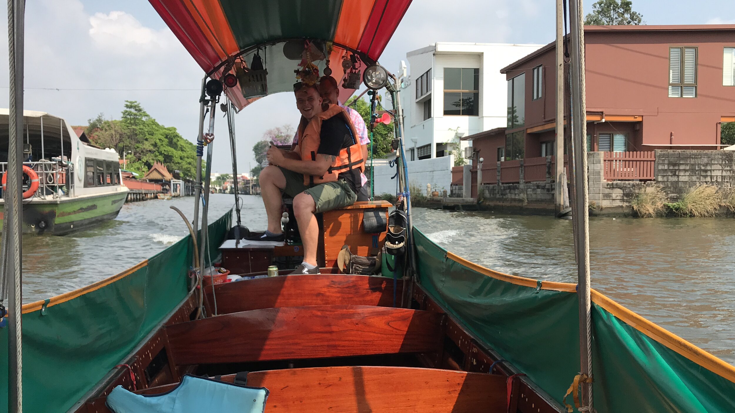 Piloting a longtail boat in one of Bangkok's canals
