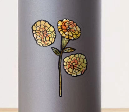 Decorative floral design with three layered flower blossoms on a gray surface.