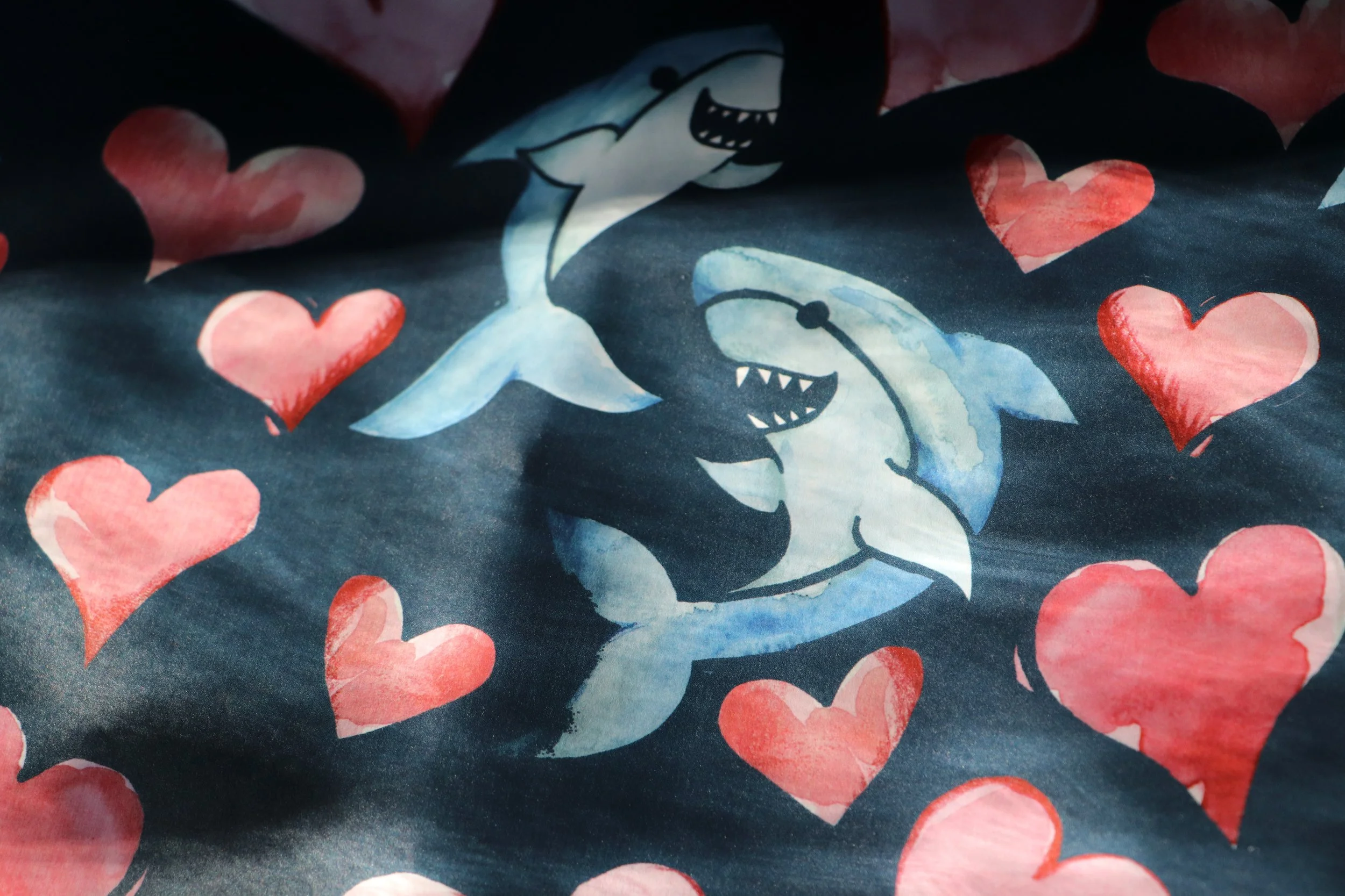 Shark Lover Wrapping Paper 1. The Language of Love
Beneath the stars, where whispered dreams align,
Two hearts entwine in rhythmic, tender beat.
A world of words could scarce this bond define,
For love alone makes poetry complete.

The rose's bloom m