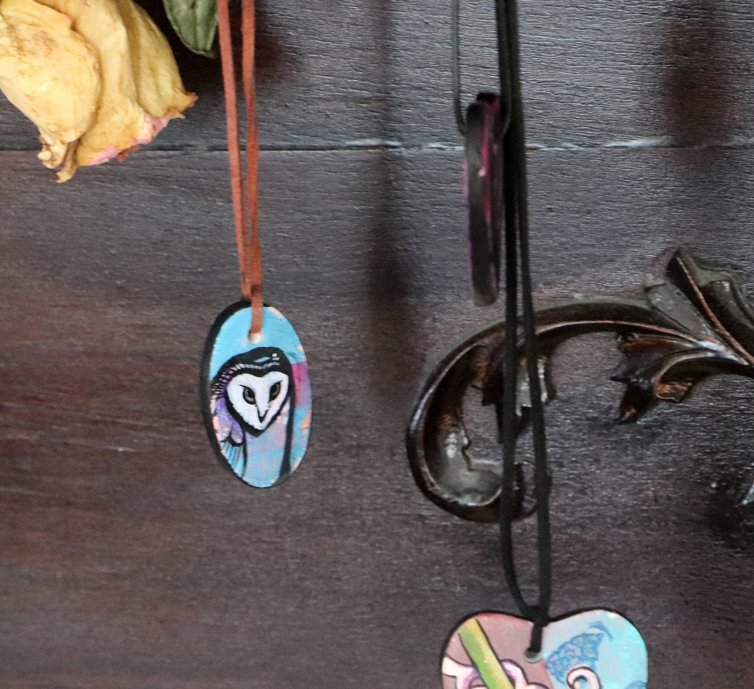 In Michigan's embrace, a barn owl soars,
Lacy's art whispers tales, ancient lores,
Sue gathers a bunch, memories entwine,
Nature's canvas, in hues, divine.