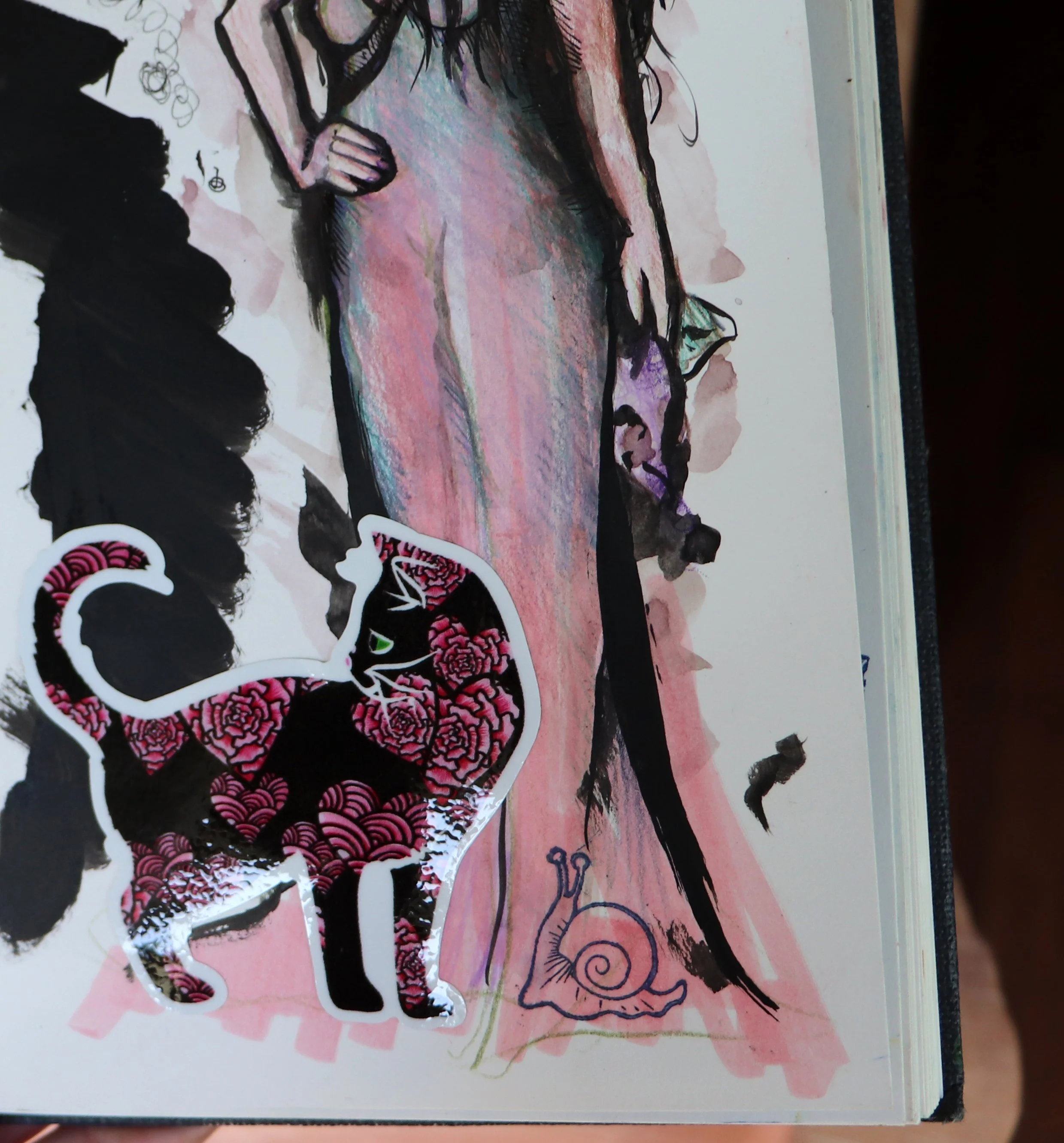 Hand-drawn illustration of a woman in a dress with a black cat sticker and a snail doodle on a white background.