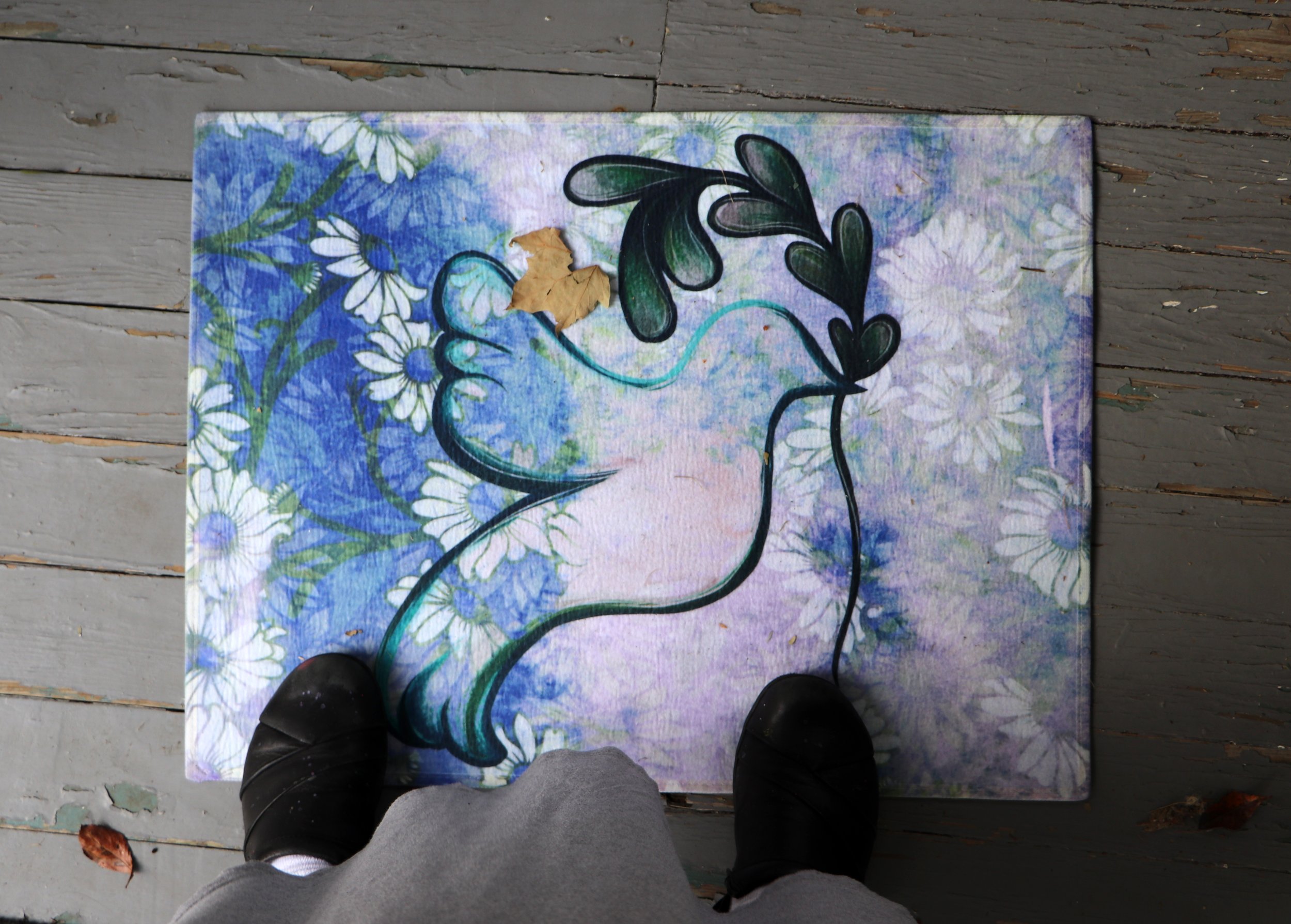 Dove of HOPE Welcome serenity into your space with this enchanting doormat featuring a graceful dove of hope and peace, delicately holding a laurel leaf. Perfect for earth lovers, feminists, and free spirits, its design radiates harmony and resilienc