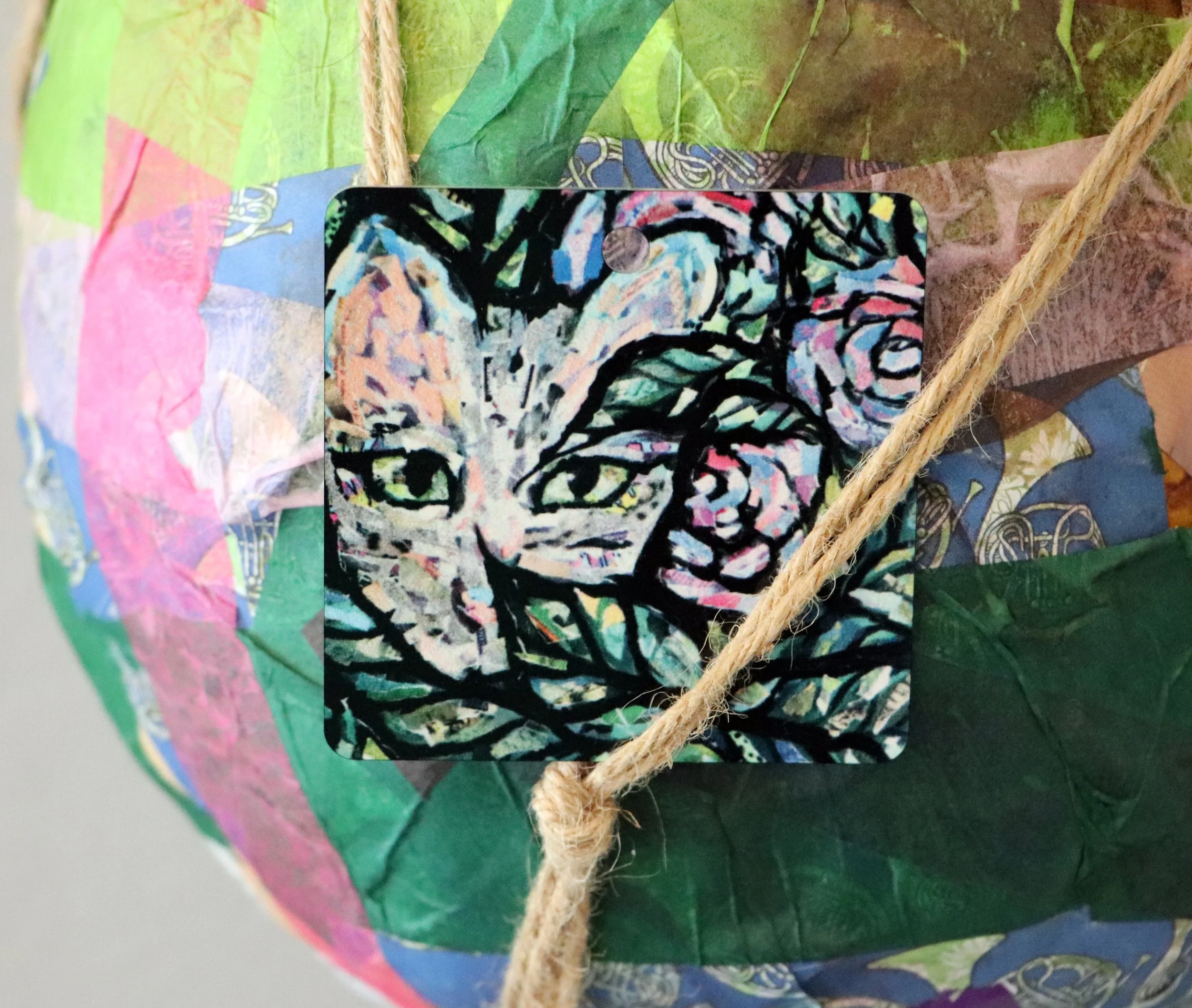 Grey cat ornaments Lacy Chenault’s expertise shines in both cat illustrations and photography. Her illustrations enchant with artistic creativity, while her photography immortalizes real-life feline beauty. Whether you adore playful sketches or breat