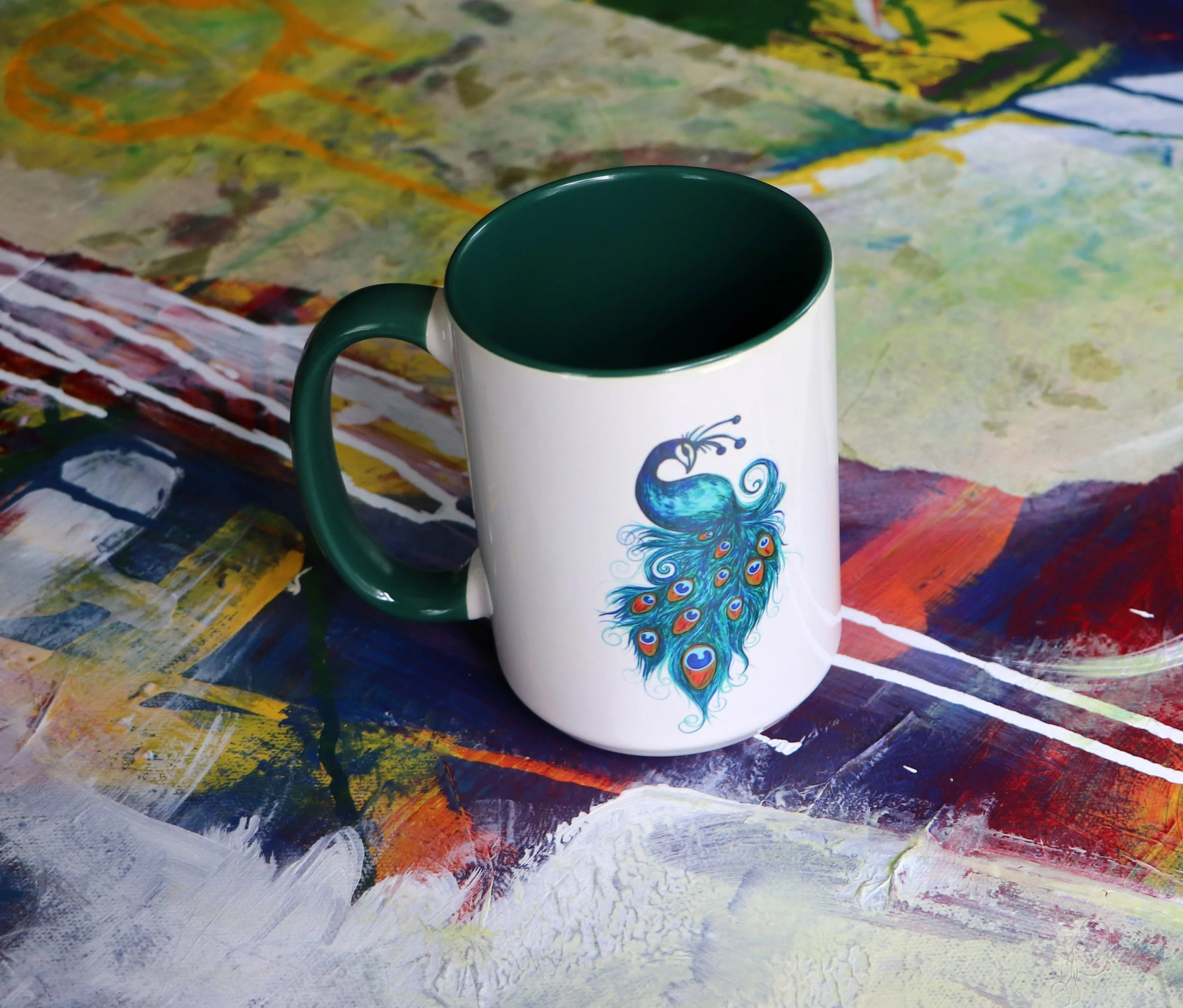 "Just as the peacock's tail blooms in full splendor, let your true colors unfurl and illuminate the world." Peacock mug