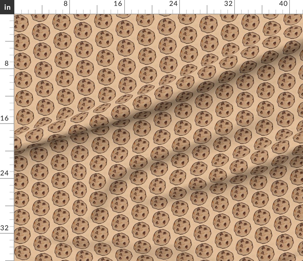A fabric with a pattern of chocolate chip cookies printed on it, featuring evenly spaced, small, circular cookie illustrations with dark chocolate chips.