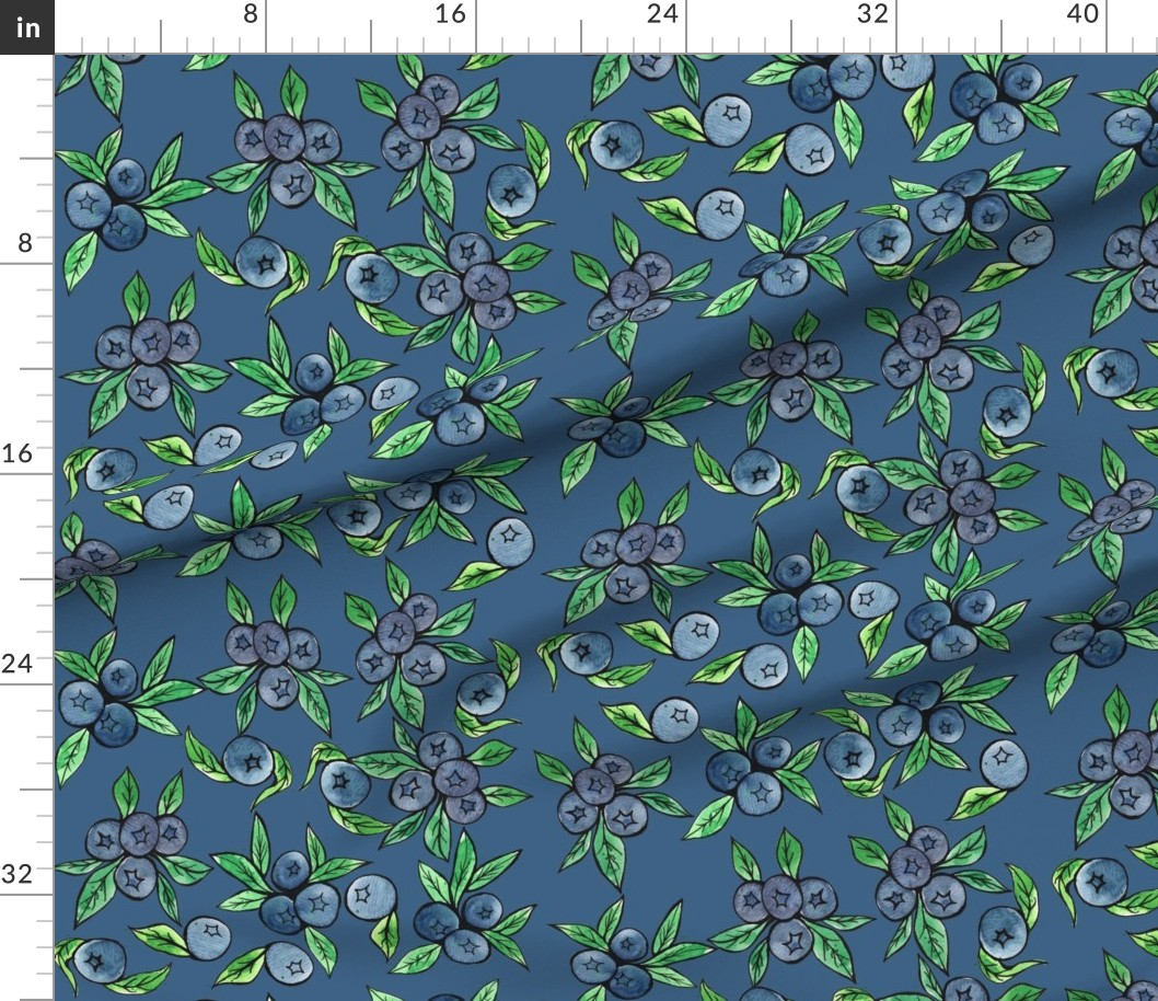 Fabric with a pattern of blueberries and green leaves on a blue background.