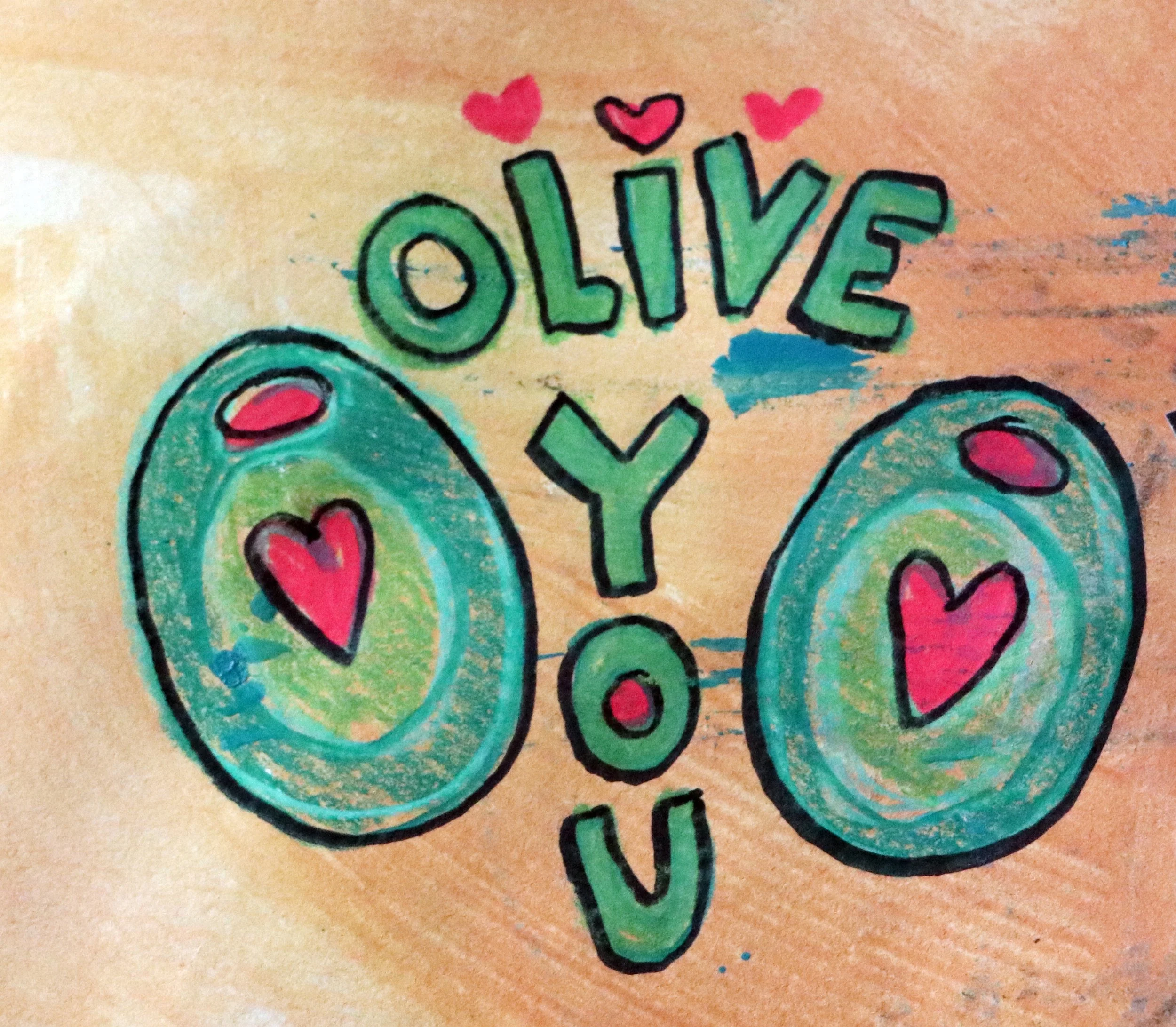 Olive You  Love's Sweet Embrace
Upon the whispering wind, your name I trace,
A melody that dances through the air.
In every petal's blush, I see your face,
A masterpiece beyond all worldly care.

Your love, a gentle tide, a steady stream,
It cradles 