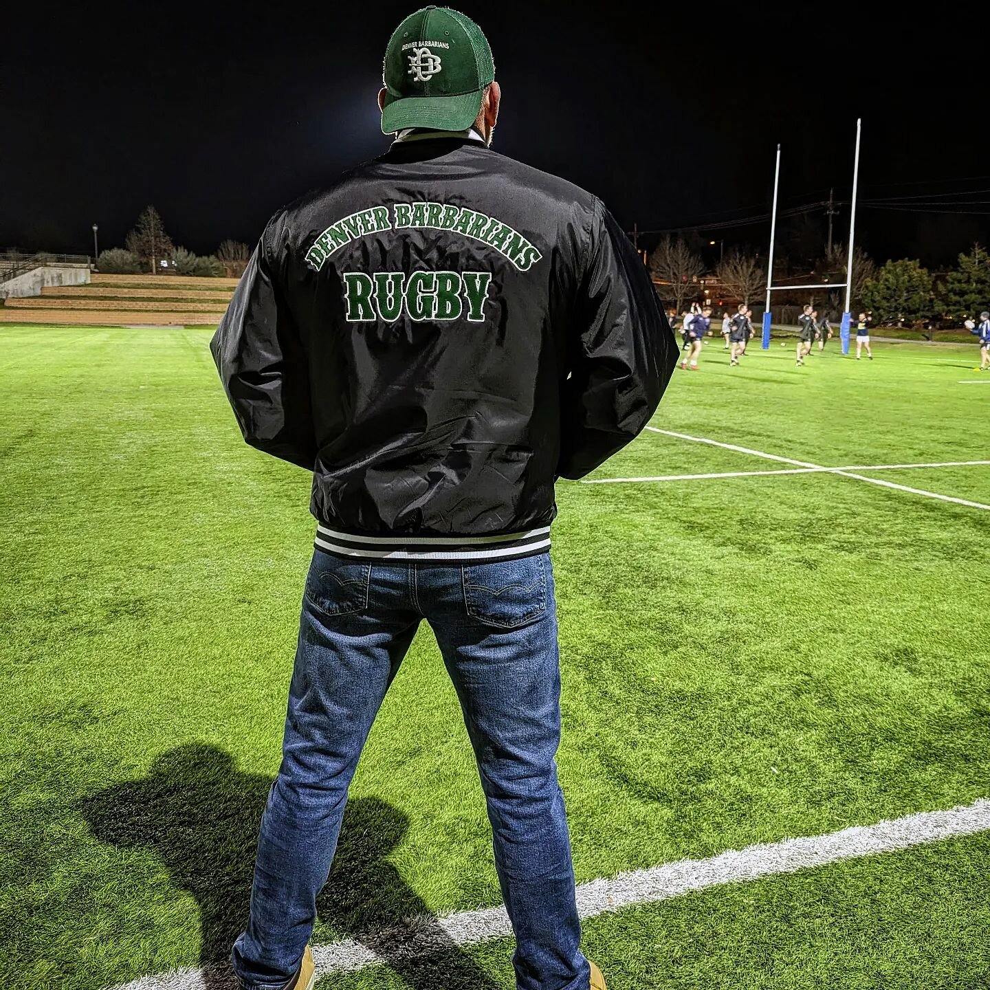 EVERYTHING IN THIS IMAGE COULD BE YOURS!!!!! ⚠️

(Except the hat, the jeans, the man, the guys in the background, the field, the goal posts, or the trees).

Okay, well not EVERYTHING, but the JACKET can definitely be yours, because we're selling them