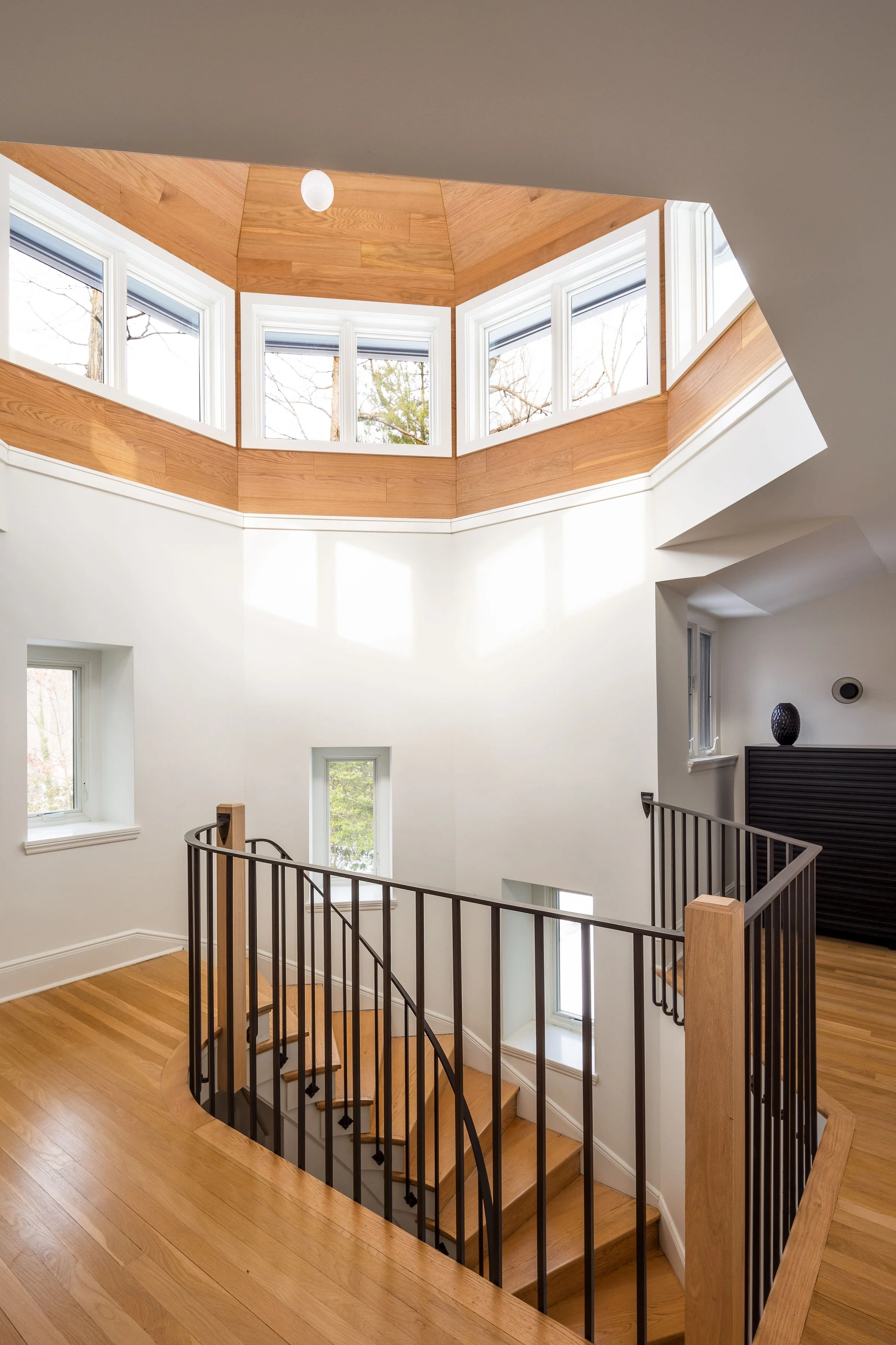 Clerestory windows and wood ceiling in modern turret