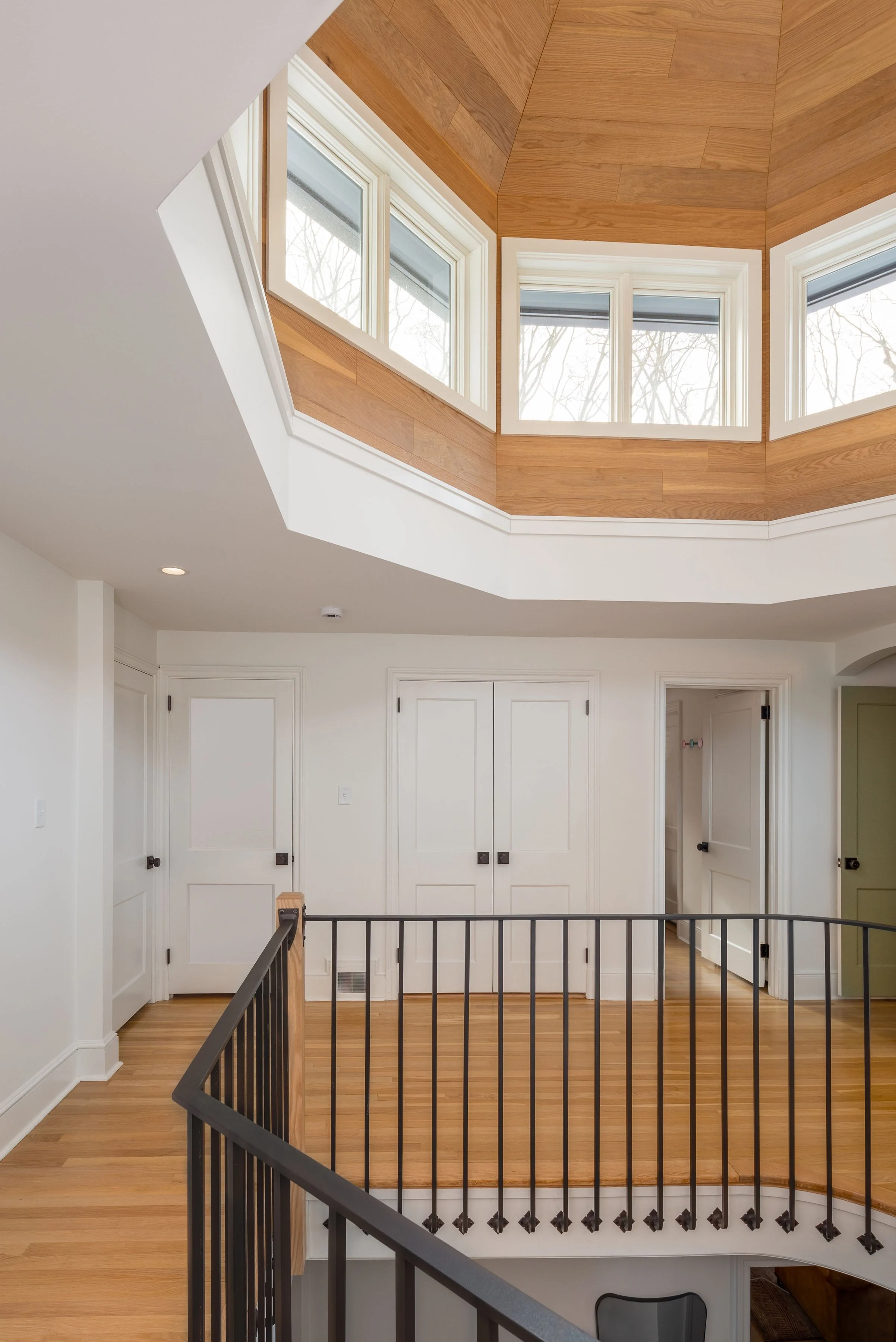 Clerestory windows and wood ceiling in modern turret