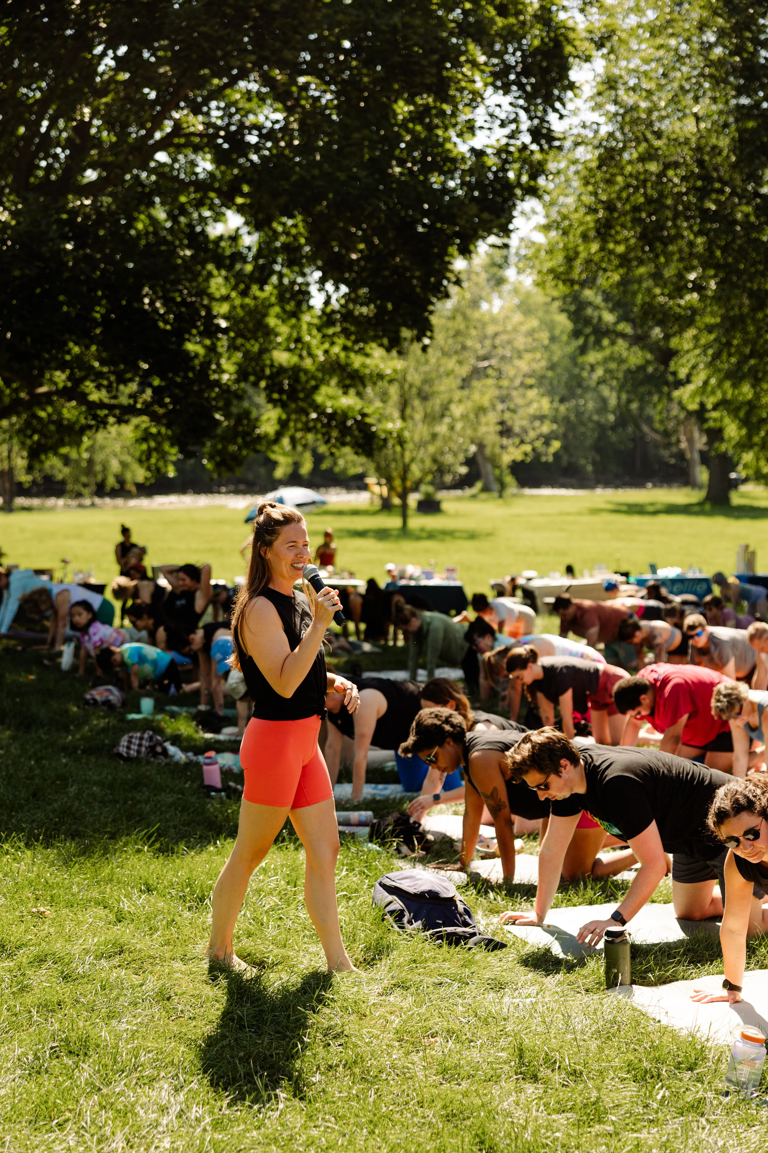 Group photo of zion well teachers in wild thing vinyasa yoga pose.