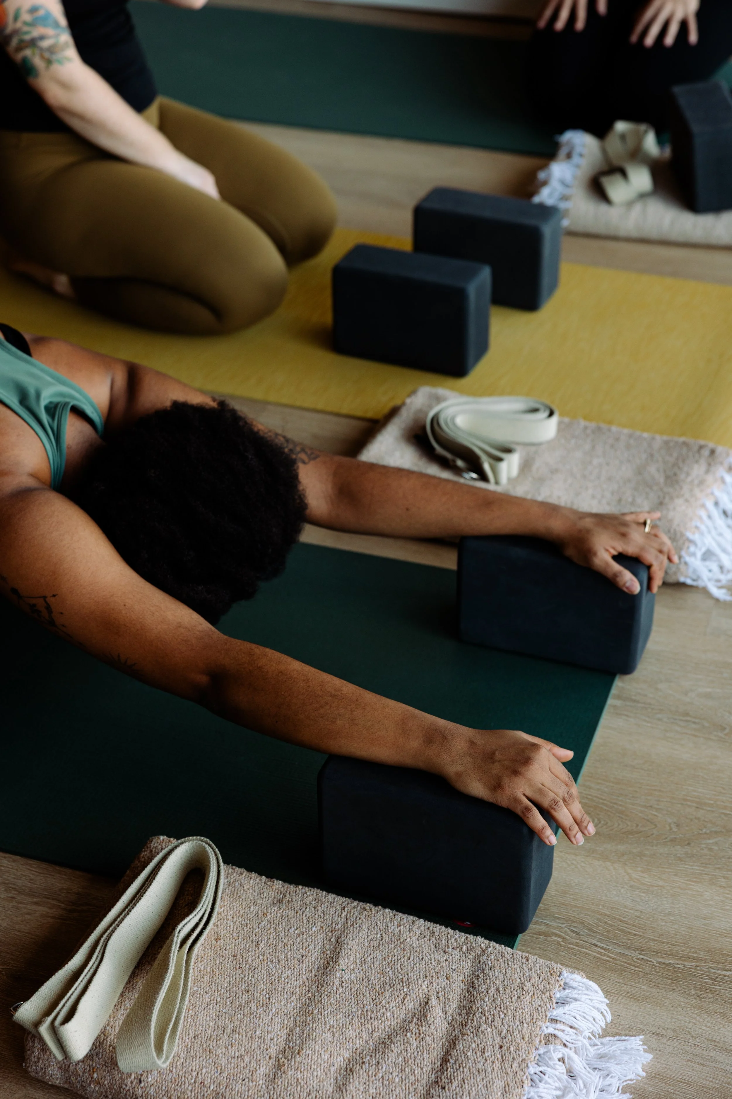 Childs pose with Misty and Sarah yoga at Ann Arbor studio
