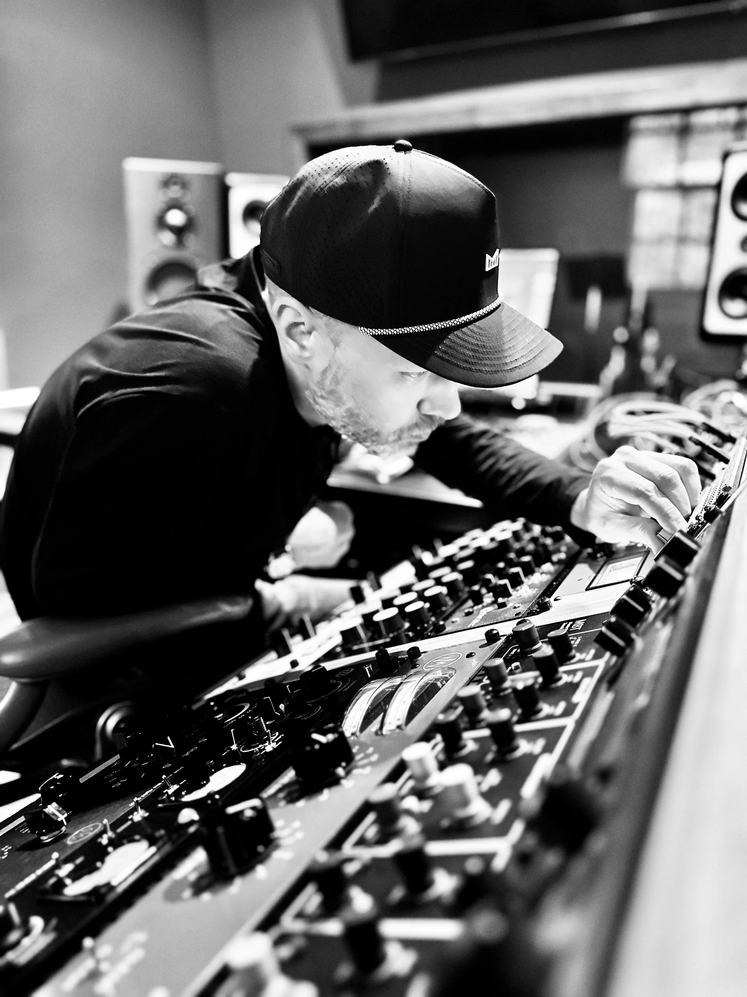 Josh, working with analog audio equipment in a Nashville mastering studio.