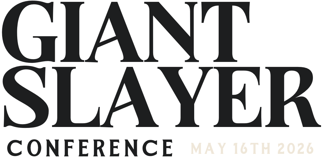 Text promoting the 'Giant Slayer Conference' scheduled for May 16th, 2026.