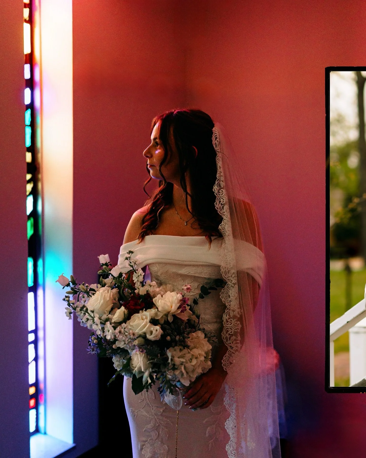 JoEllen + Benjamin got married at St. Joseph Catholic Church in Shawnee, KS last Saturday, and I have thoughts. 

I was with JoEllen while she was tucked away getting ready for the ceremony. I noticed this stained glass light pouring in and asked if 