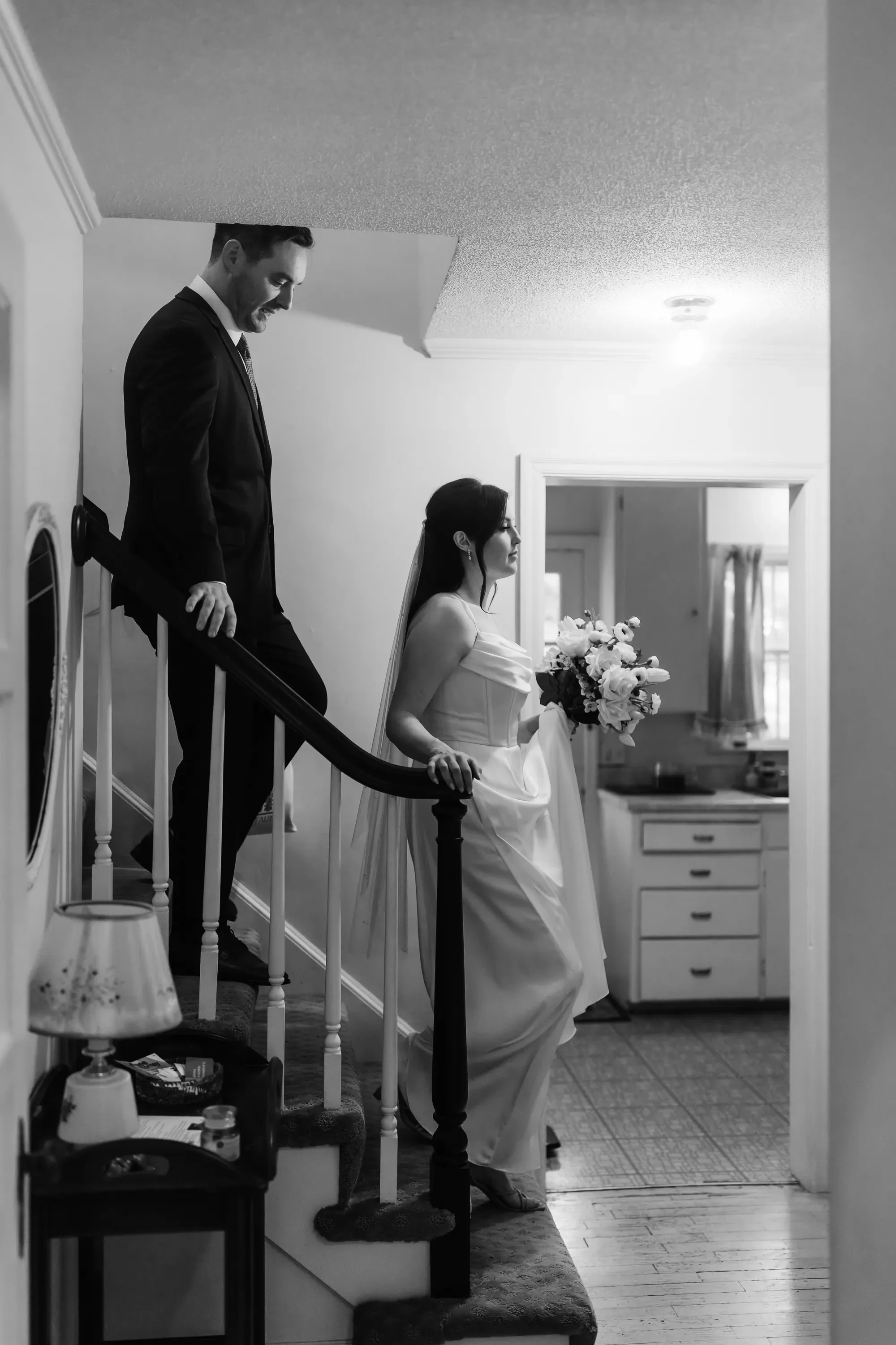 08-descending-cottage-staircase-bw-pilgrim-chapel-kansas-city.webp