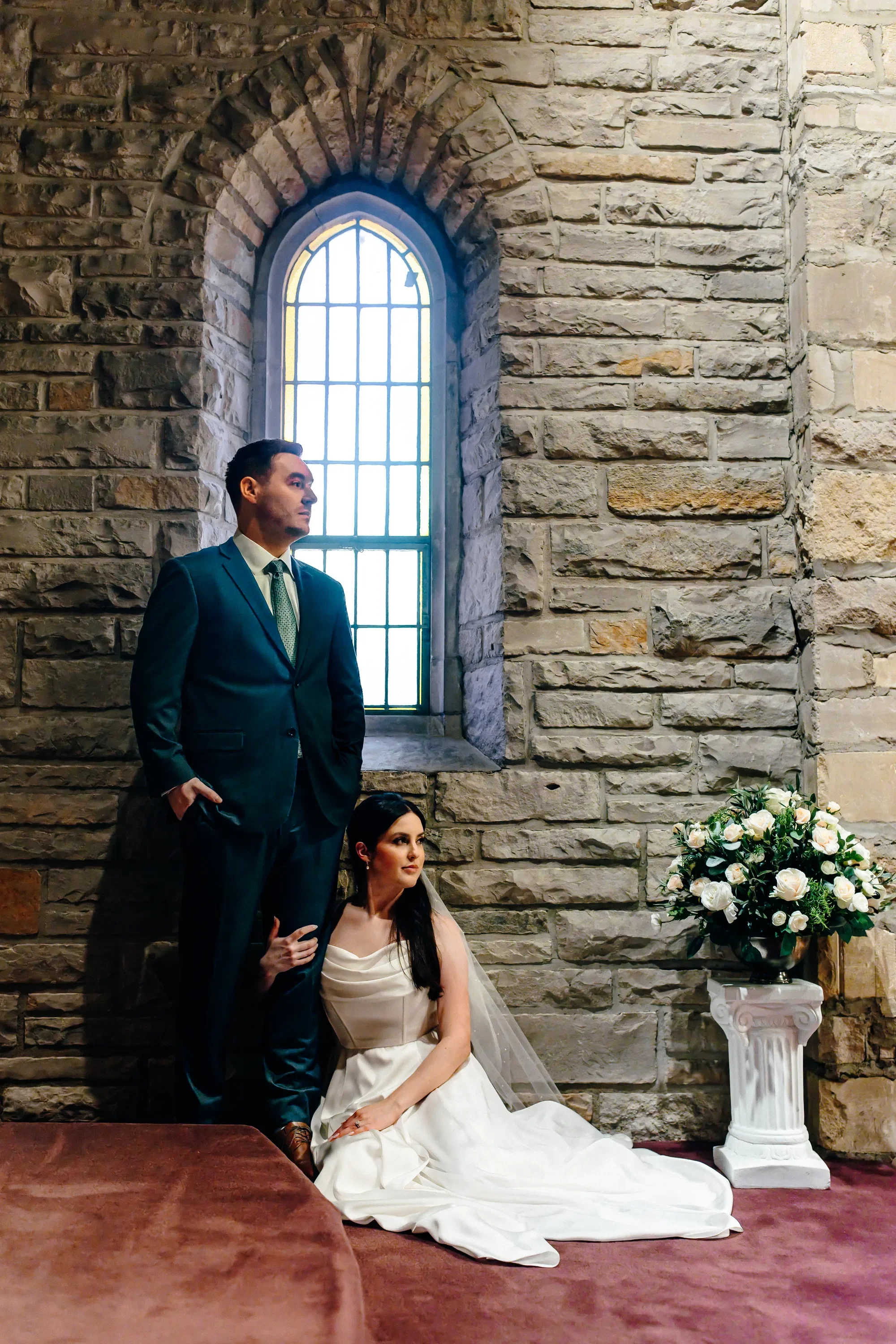15-bride-seated-on-altar-step-portrait-pilgrim-chapel-kansas-city.webp