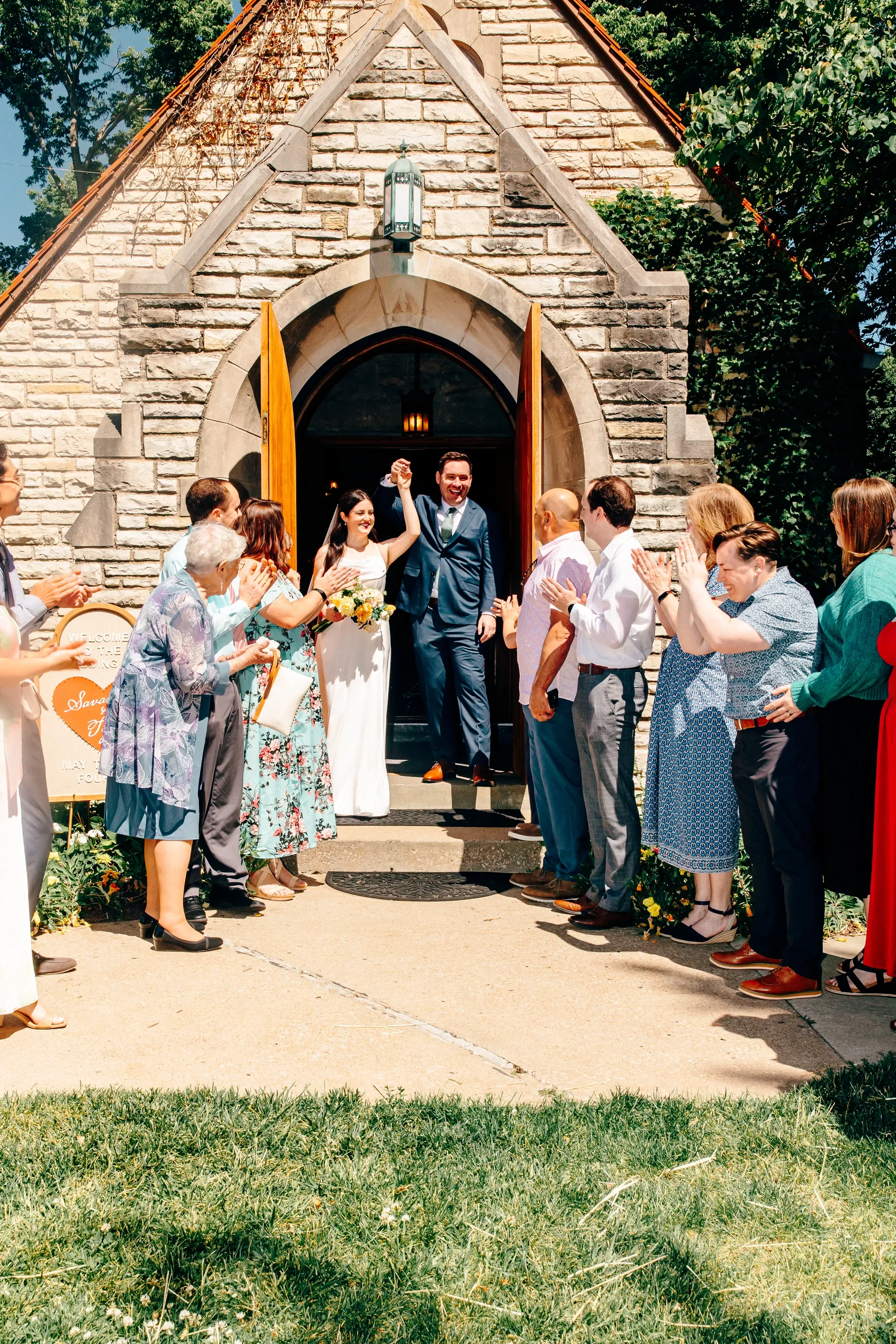 22-chapel-exit-hands-raised-pilgrim-chapel-kansas-city.webp