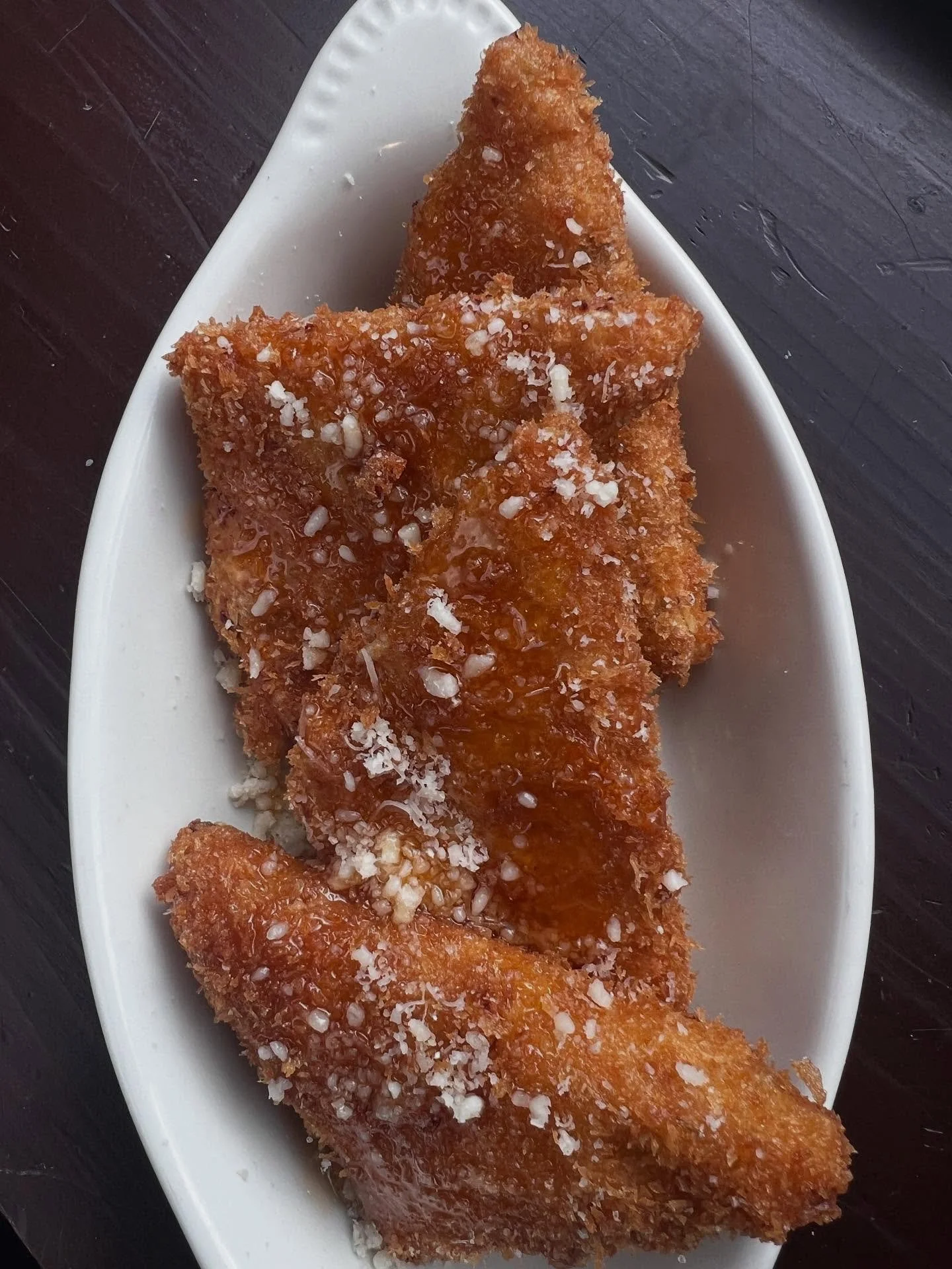 SPAGHETTI BITES 
SPAGHETTI, GOAT CHEESE, HOT HONEY ABD PARM